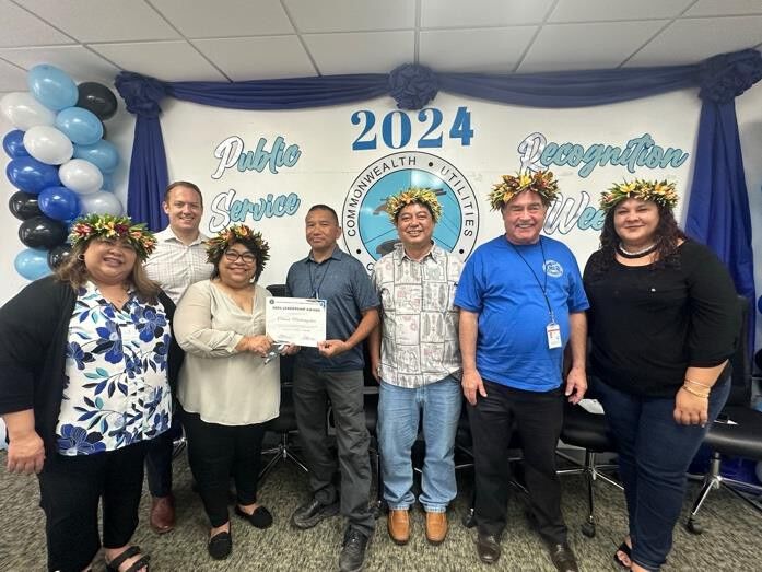 Carson Madrangchar, CUC’s Wastewater Supervisor, was awarded the 2024 Leadership Award. Other Leadership Awardees include: CUC’s Compliance Administrator Vicente Deleon Guerrero,  Water and Wastewater Engineers Nicolette Villagomez and Alley Reyes, and Fiscal Analyst:  Billing Supervisor Therese Terlaje. Pictured with Madrangchar, from left, are Acting Executive Director Betty Terlaje, Legal Counsel Hunter Hunt, Board Chairperson Janice  Ada  Tenorio,  Board  Treasurer  Rufo  T. Mafnas, CUC Deputy Executive Director  Kevin Watson, MPA, and Board Member Rebecca C. White.