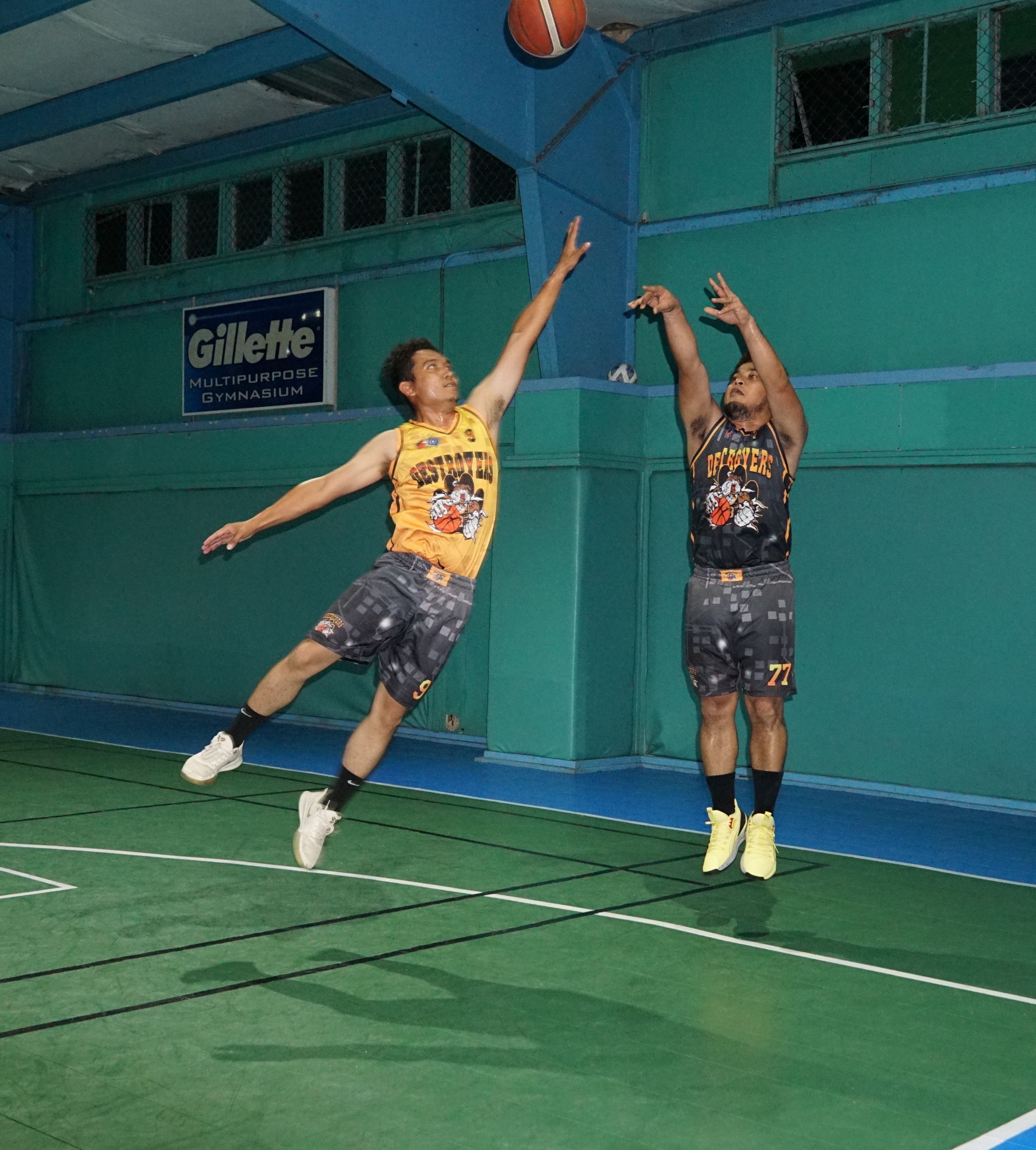 Bio-Pro's Mark Matuguina takes the three-point shot over a defender during a game in the Destroyers Friendly Games League at the TSL Sports Complex on Saturday.
