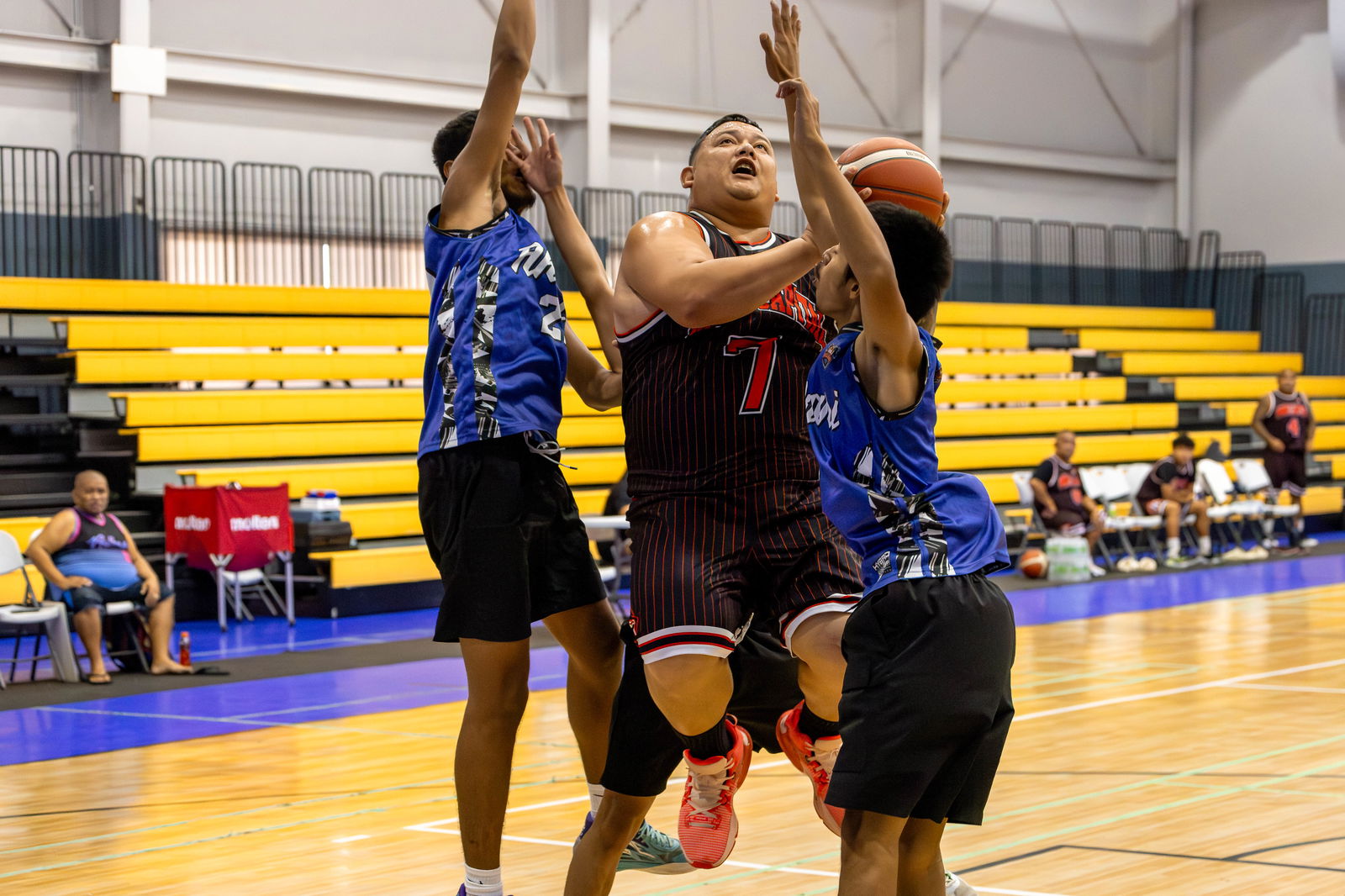 Bridge Capital's Matt Duenas gets fouled as he goes up for the shot during a game in the Michelob Ultra Cup 2024 at the Ada gym.