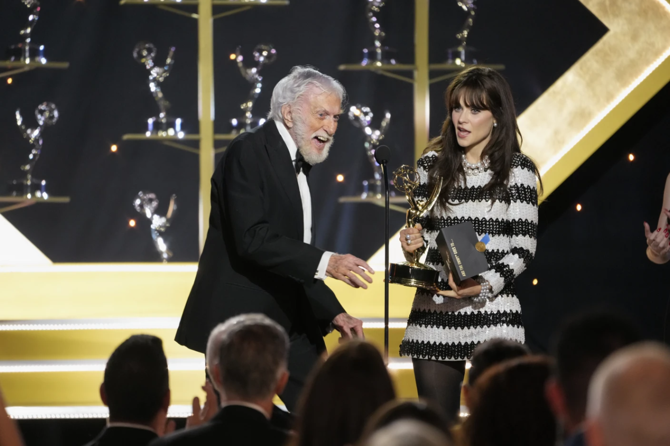 Zooey Deschanel, right, presents the award for outstanding guest performance in a daytime drama series to Dick Van Dyke for "Days of our Lives" during the 51st Daytime Emmy Awards on Friday, June 7, 2024, at the Westin Bonaventure in Los Angeles.