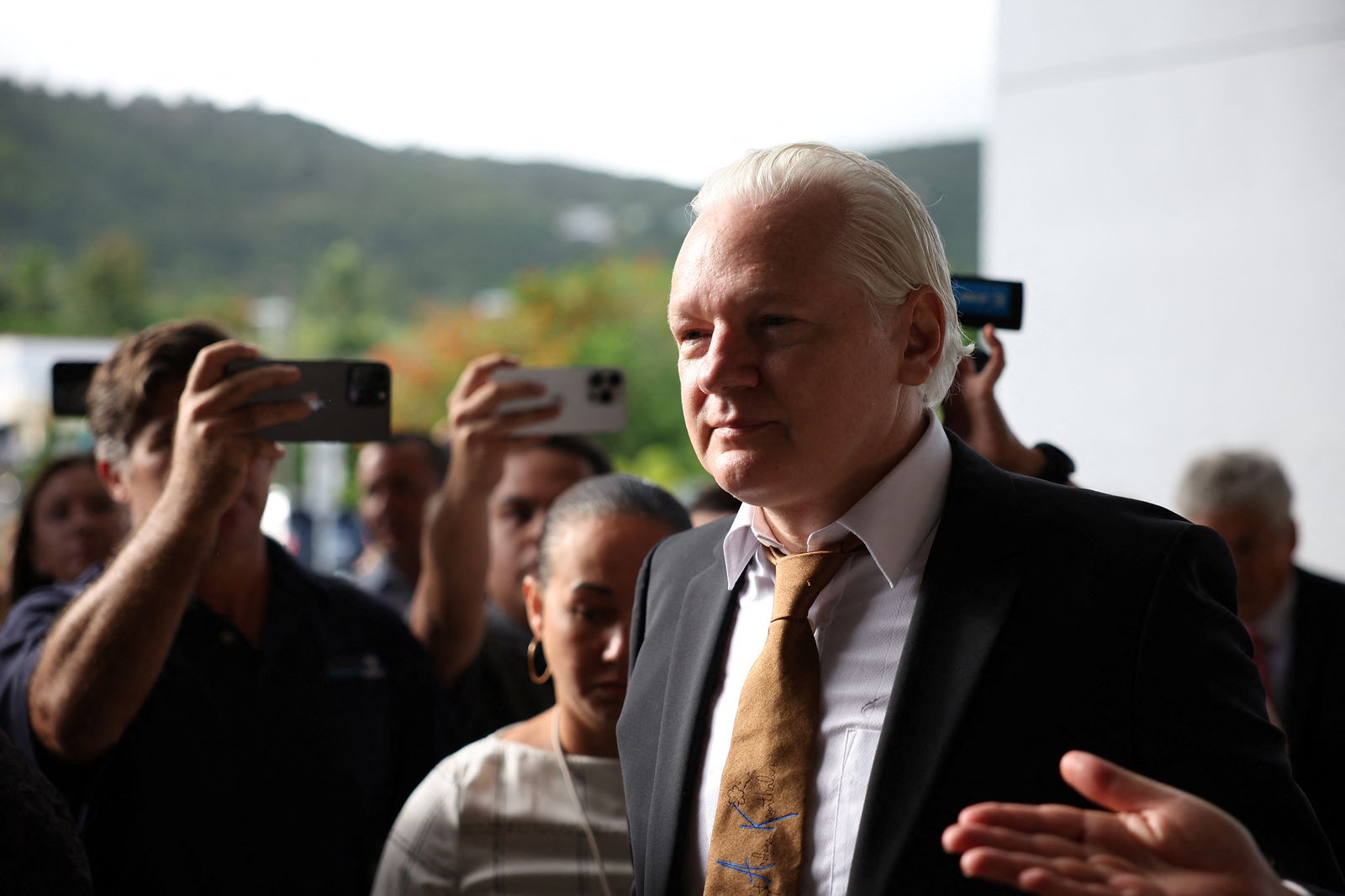 WikiLeaks founder Julian Assange arrives at a United States District Court in Saipan, Northern Mariana Islands, June 26, 2024. 
