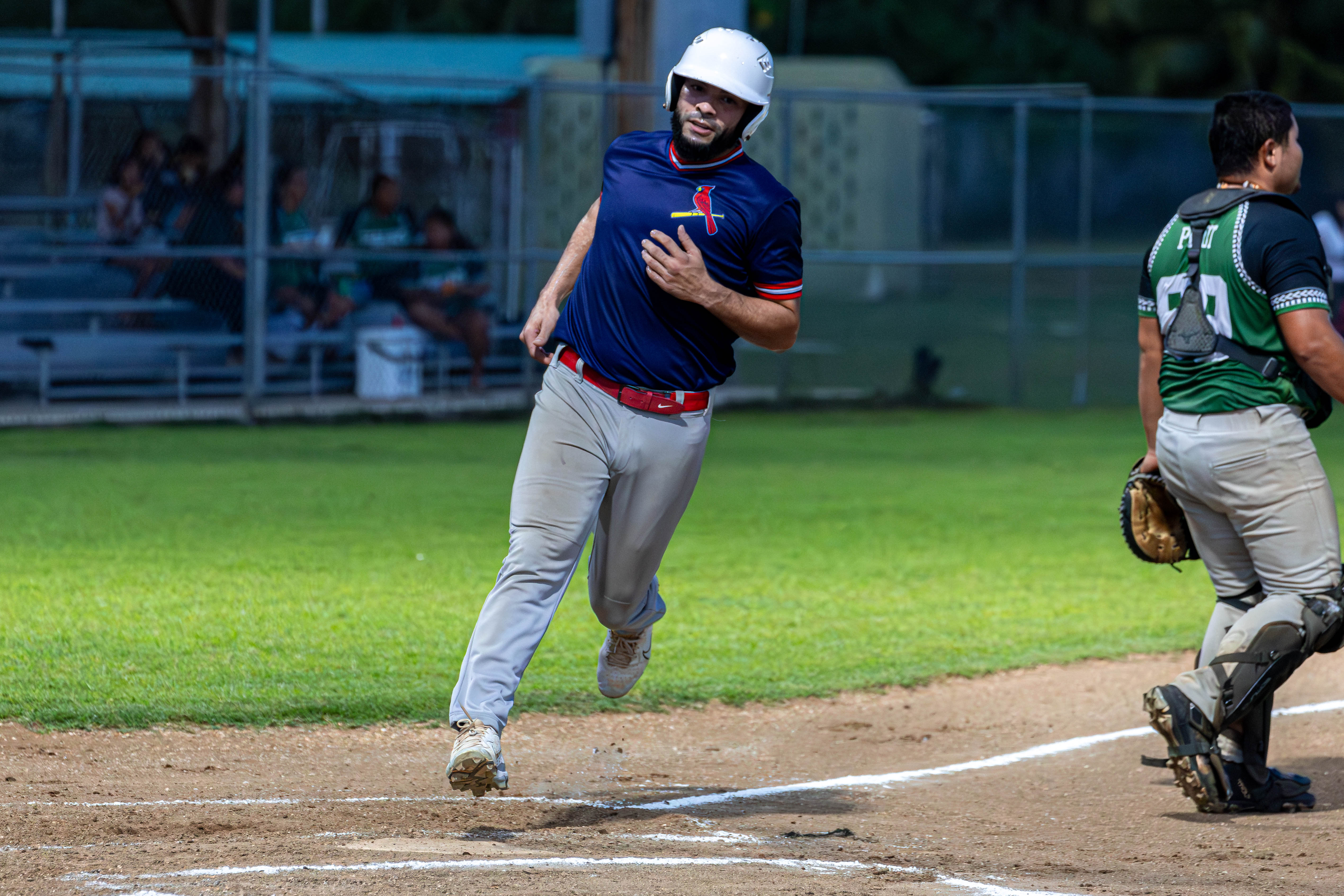 The Cardinals' Eli Augenbach reaches home base for a stolen run during a game against D9er's in the 2024 Tan Holdings Saipan Baseball League at the Francisco "Tan Ko" Palacios Baseball Field on Wednesday. 