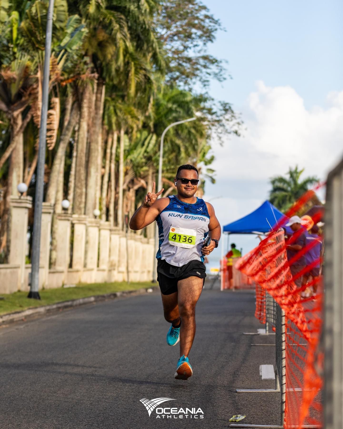 Edward Dela Cruz Jr. flashes the peace sign as he competes in the Munro Leys Suva Marathon’s 10.55K road race during the 2024 Oceania Athletics Championships in Suva, Fiji early this month. 