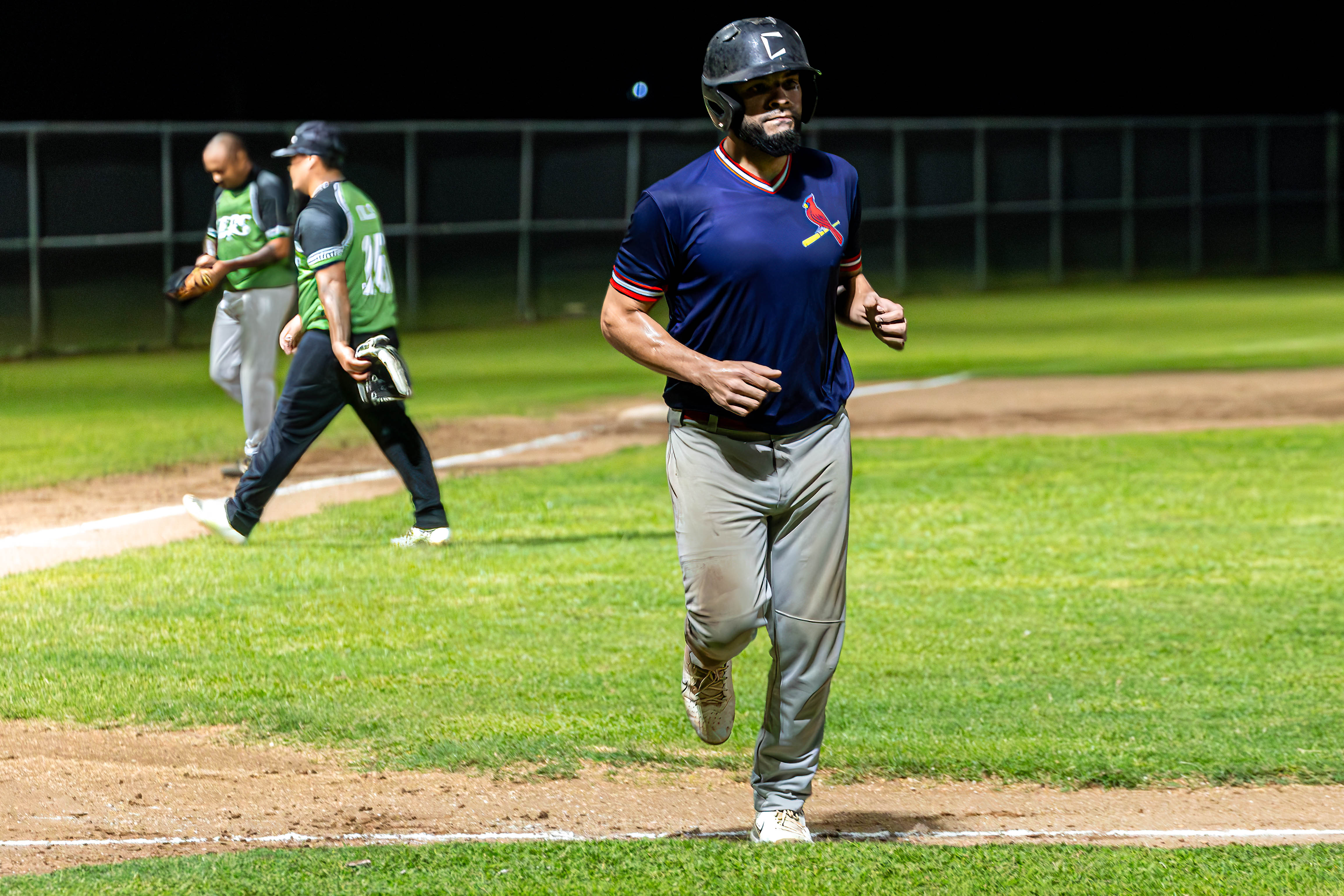 The Cardinals' Eli Augenbach runs in for the team.