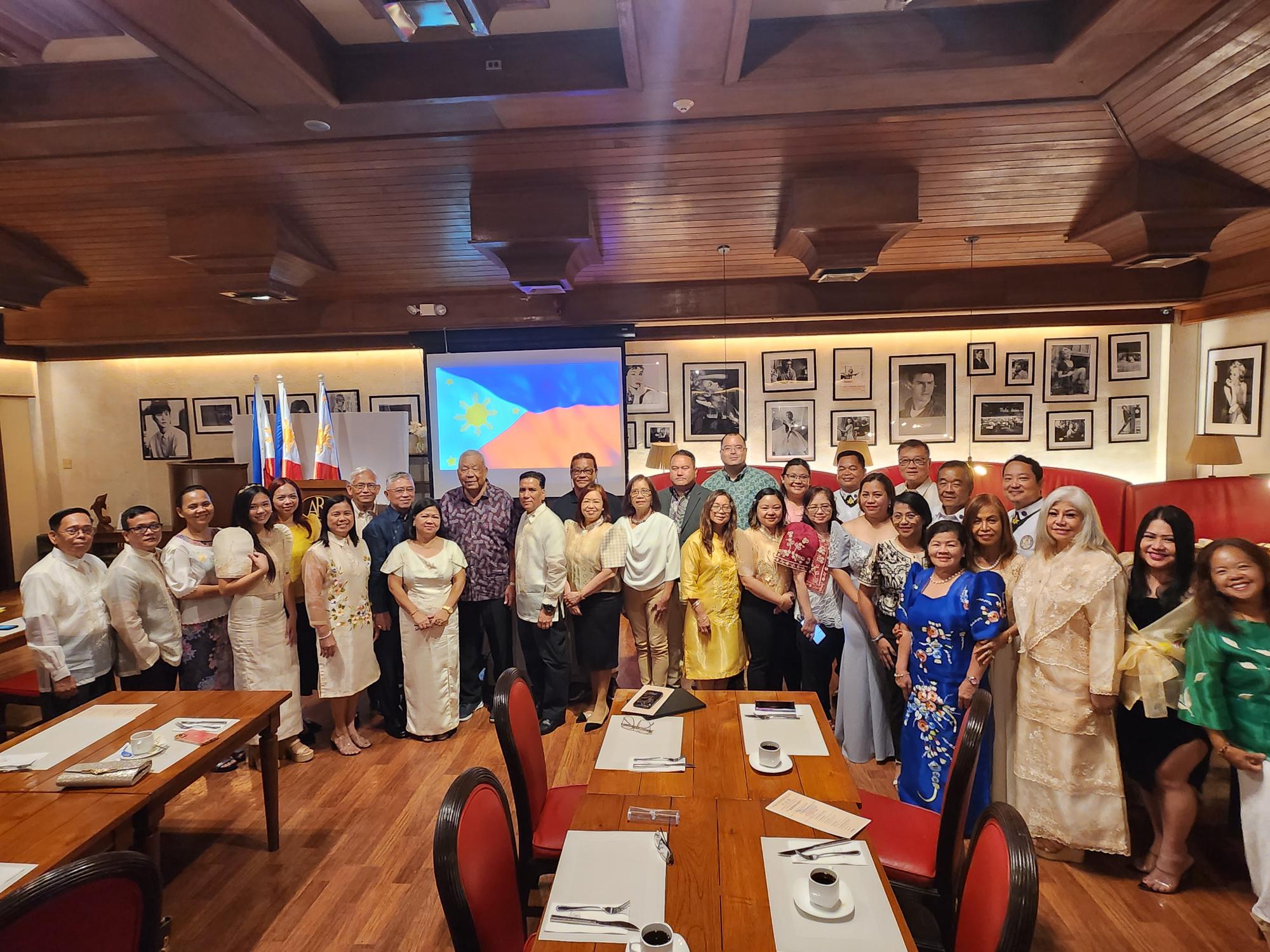 CNMI officials with Filipino community members and Philippine Consul to Guam Joaquin Ricardo Aragon. 