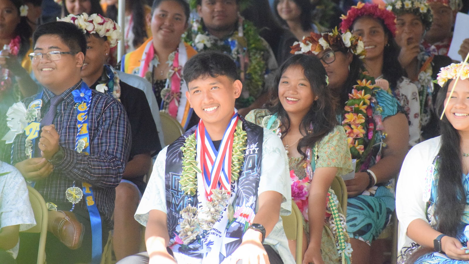 Admiral Herbert G. Hopwood Middle School valedictorian Evan McLaren Carlo Paras Cabrera and his fellow promotees listen to the opening remarks.