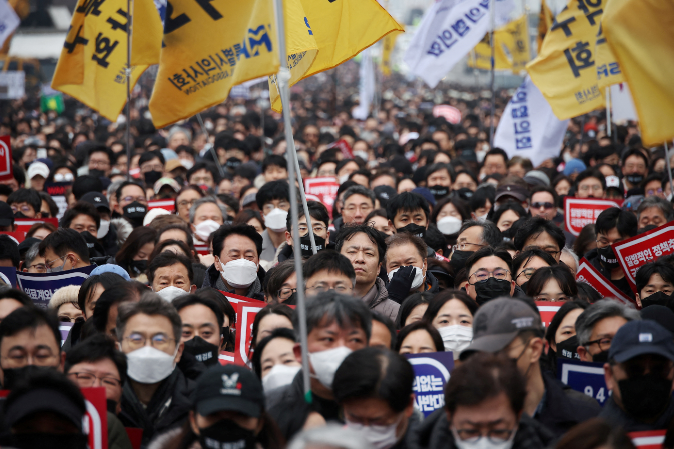 Doctors take part in a rally to protest against government plans to increase medical school admissions in Seoul, South Korea, March 3, 2024.