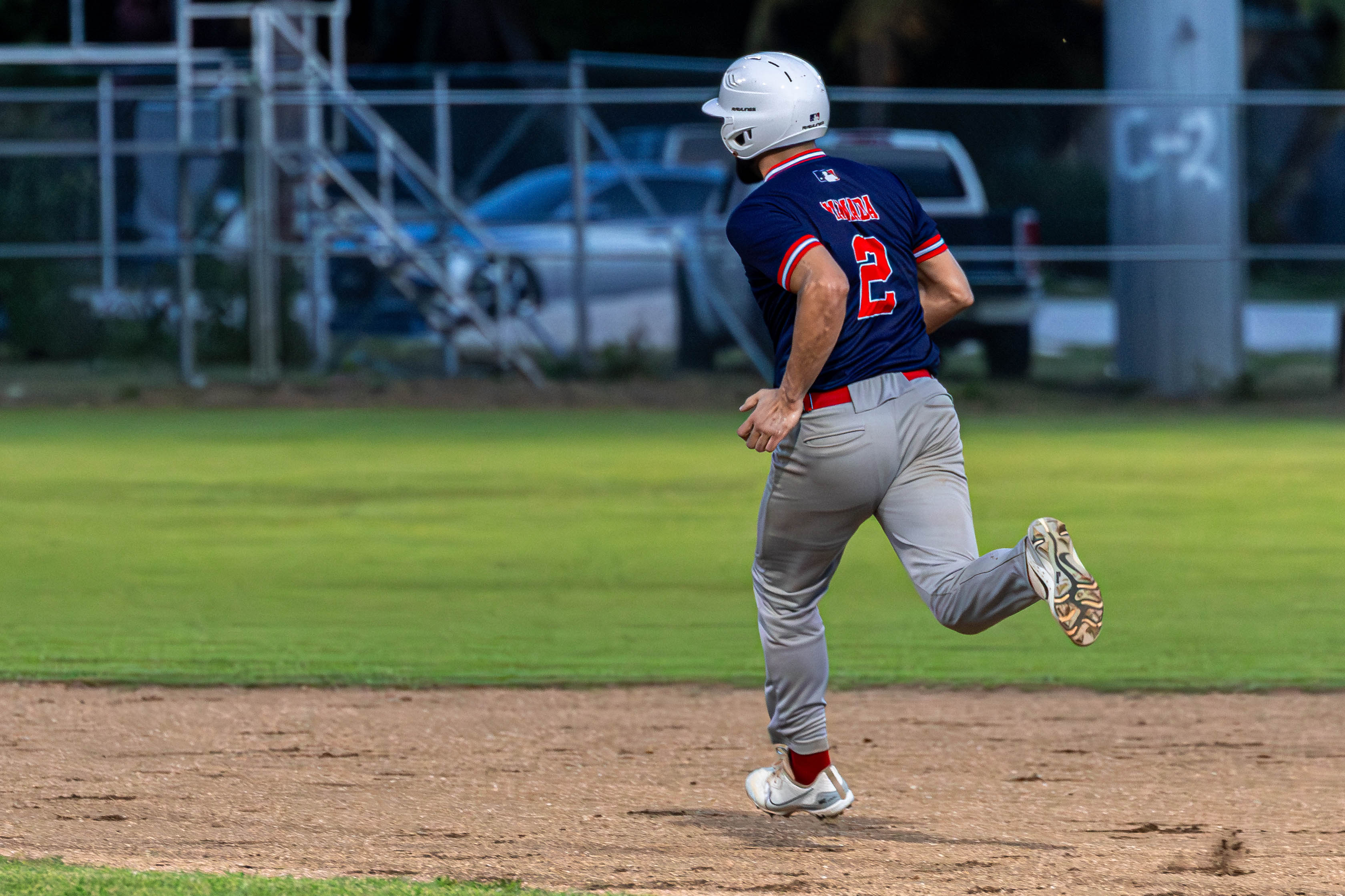 The Cardinals Eli Augenbach sprints for the steal to 2nd Base against the D9ners.