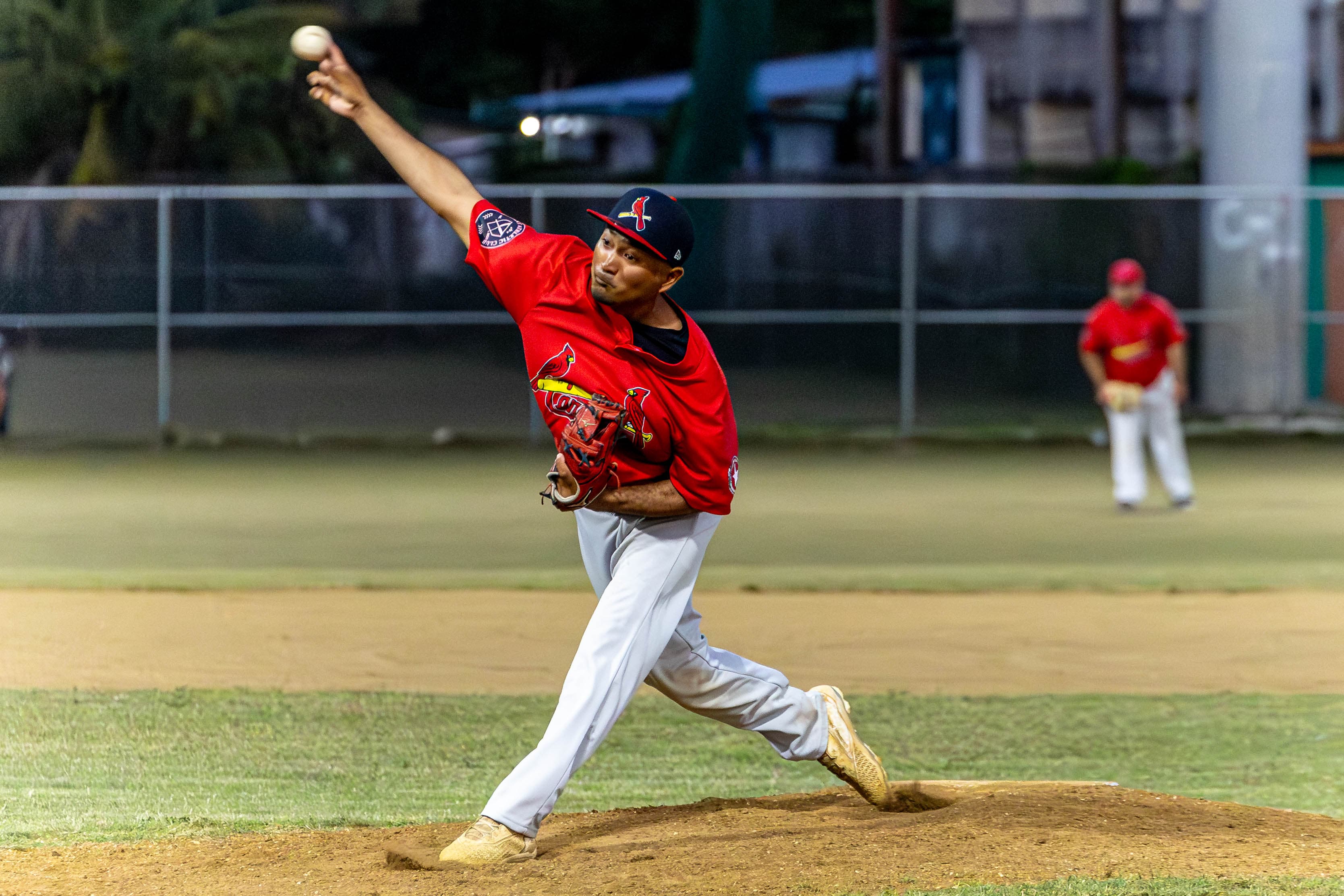 The Cardinals' KJ Villagomez pitches against the Braves during a game in the 2024 Tan Holdings Saipan Baseball League at the Francisco "Tan Ko" Palacios Baseball Field.