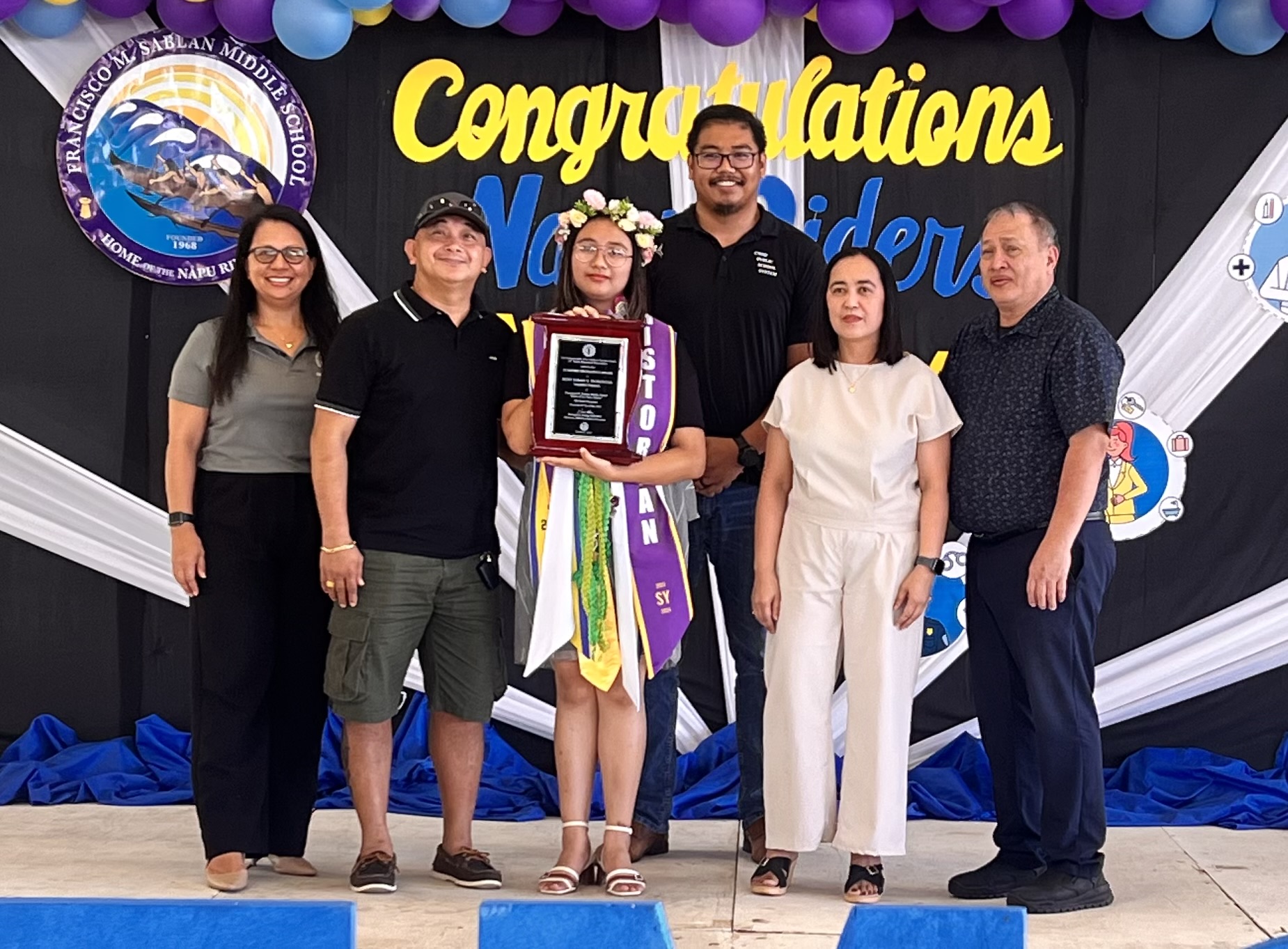 The Board of Education Academic Excellence Award was presented to class valedictorian Rexy Eirah Doronila by Acting BOE Chair Maisie B. Tenorio, who was joined by BOE members Andrew L. Orsini and Antonio L. Borja in presenting the award.