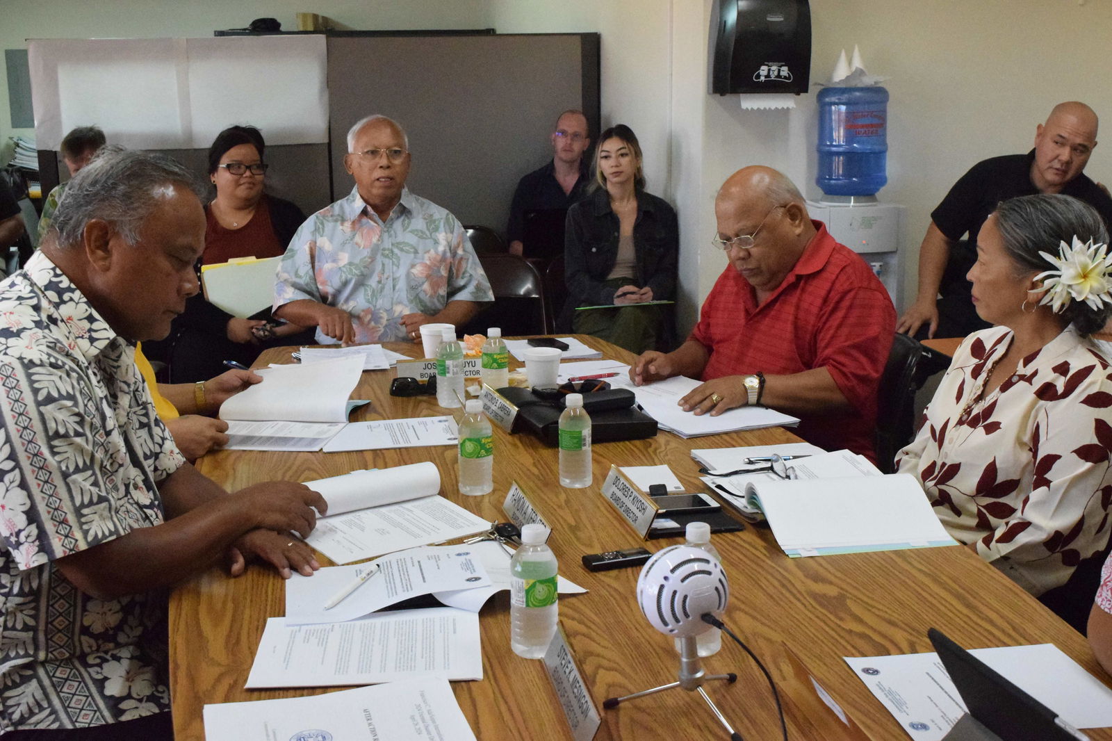 Commonwealth Ports Authority Board Chair Jose C. Ayuyu speaks as board members Ramon Tebuteb, left, vice chair Antonio Cabrera, second right, and board member Dolores Kiyoshi, right, listen during a board meeting Friday in the CPA’s board conference room.
