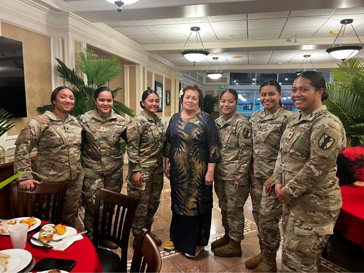 Amata with women service members.