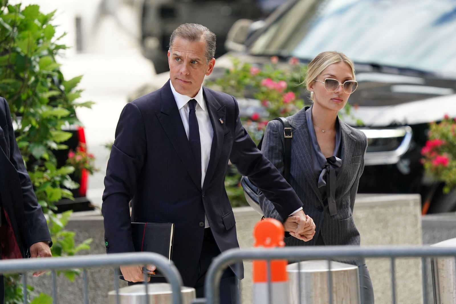Hunter Biden, son of President Joe Biden, arrives at the federal court with his wife Melissa Cohen Biden, on the opening day of his trial on criminal gun charges in Wilmington, Delaware, June 3, 2024.