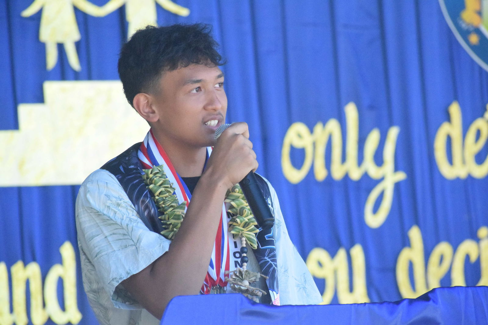 Admiral Herbert G. Hopwood Middle School valedictorian Evan McLaren Carlo Paras Cabrera delivers his valedictory address.