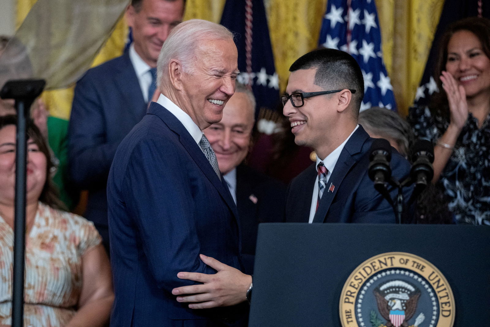 DACA recipient Javier Quiroz Castro introduces President Joe Biden, before the announcement an executive action to provide immigration relief for spouses of U.S. citizens, coinciding with the 12th anniversary of the Deferred Action for Childhood Arrivals program, at the White House in Washington, D.C., June 18, 2024.