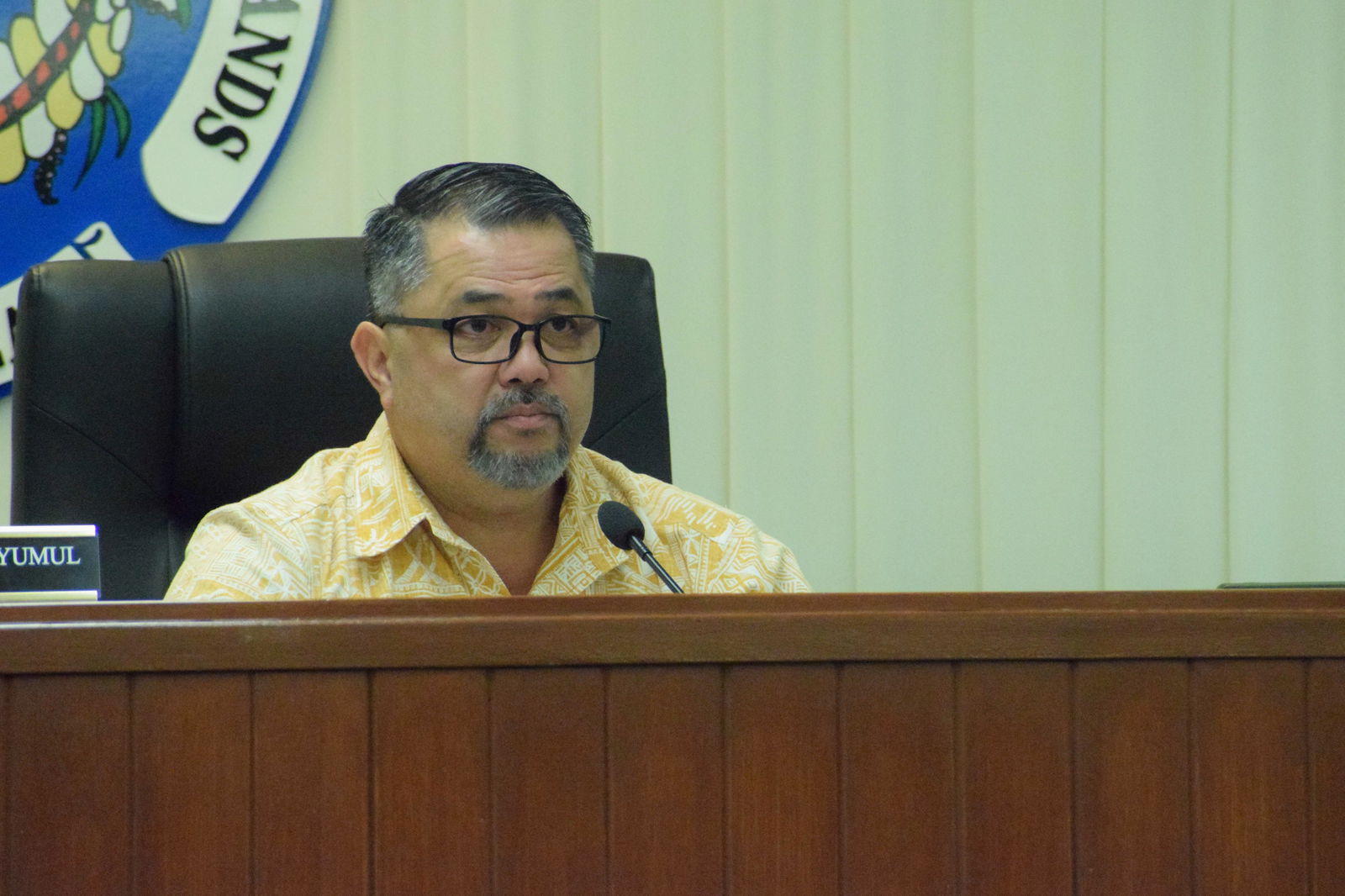 House Ways and Means Committee Chair Ralph N. Yumul speaks during a budget hearing for the Department of Corrections on Thursday in the House chamber.