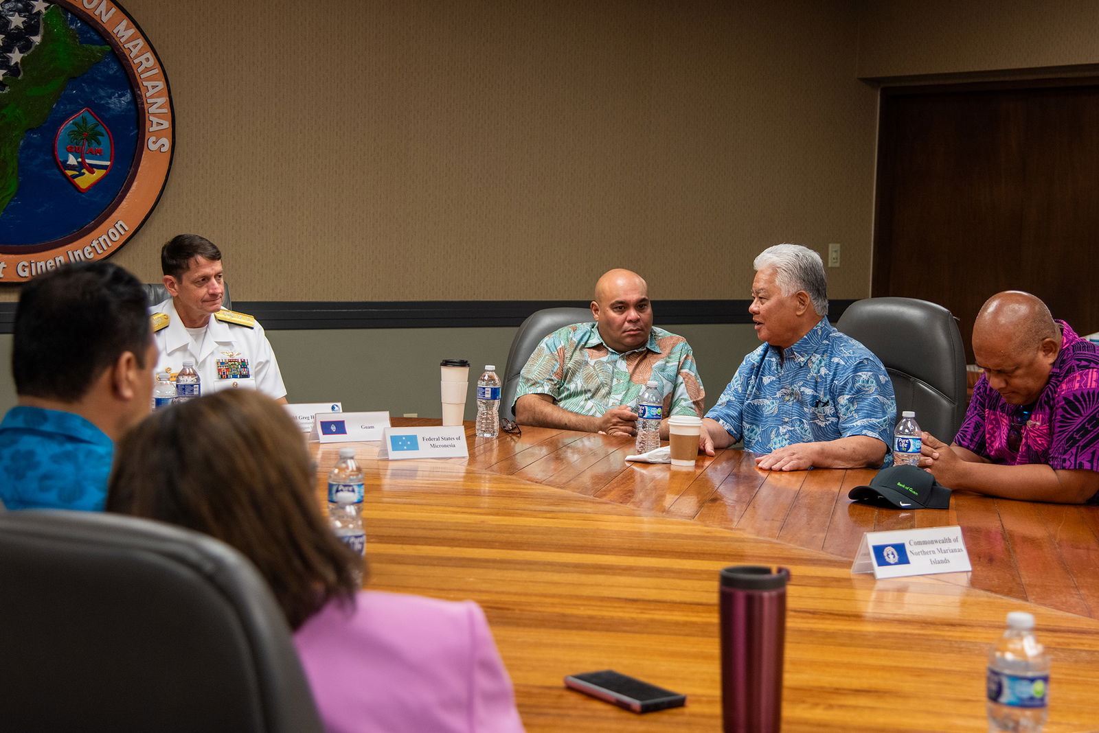 Rear Adm. Greg Huffman, commander, Joint Region Marianas, meets with regional island leaders, including CNMI Gov. Arnold I. Palacios, during a Micronesian Island Forum discussion, June 5. 