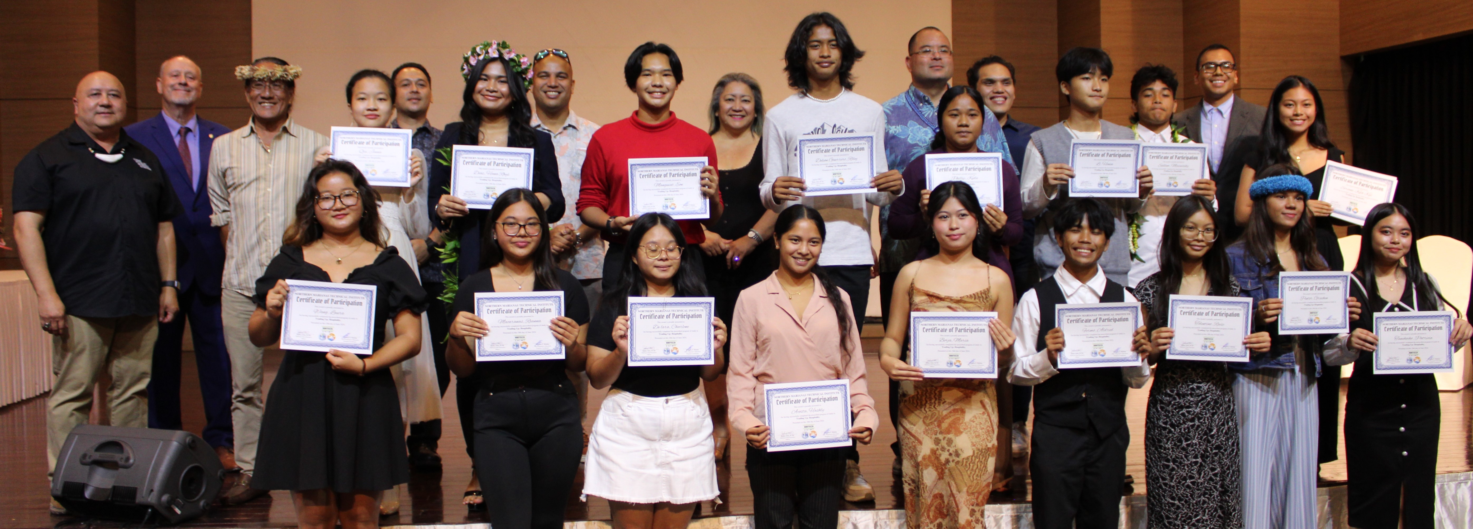 Marianas High School hospitality students with Principal Johnathan Augon and Vice Principal Rolomor Orsini.