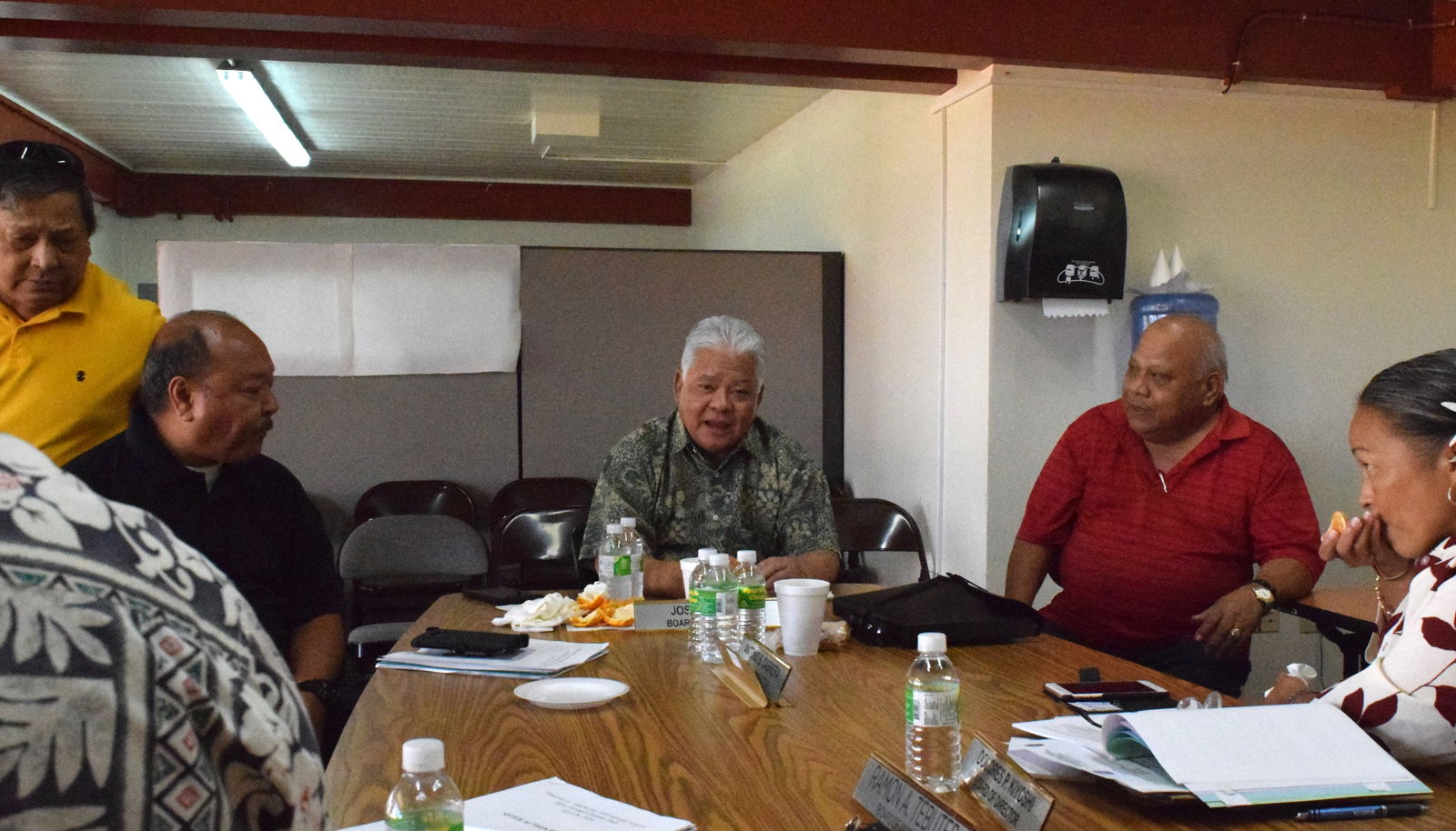 Gov. Arnold I. Palacios, center, speaks as Commonwealth Ports Authority board member Joseph Diaz, board member Steve Mesngon, vice chair Antonio Cabrera and board member Dolores Kiyoshi listen during a break from a CPA board meeting on Friday.