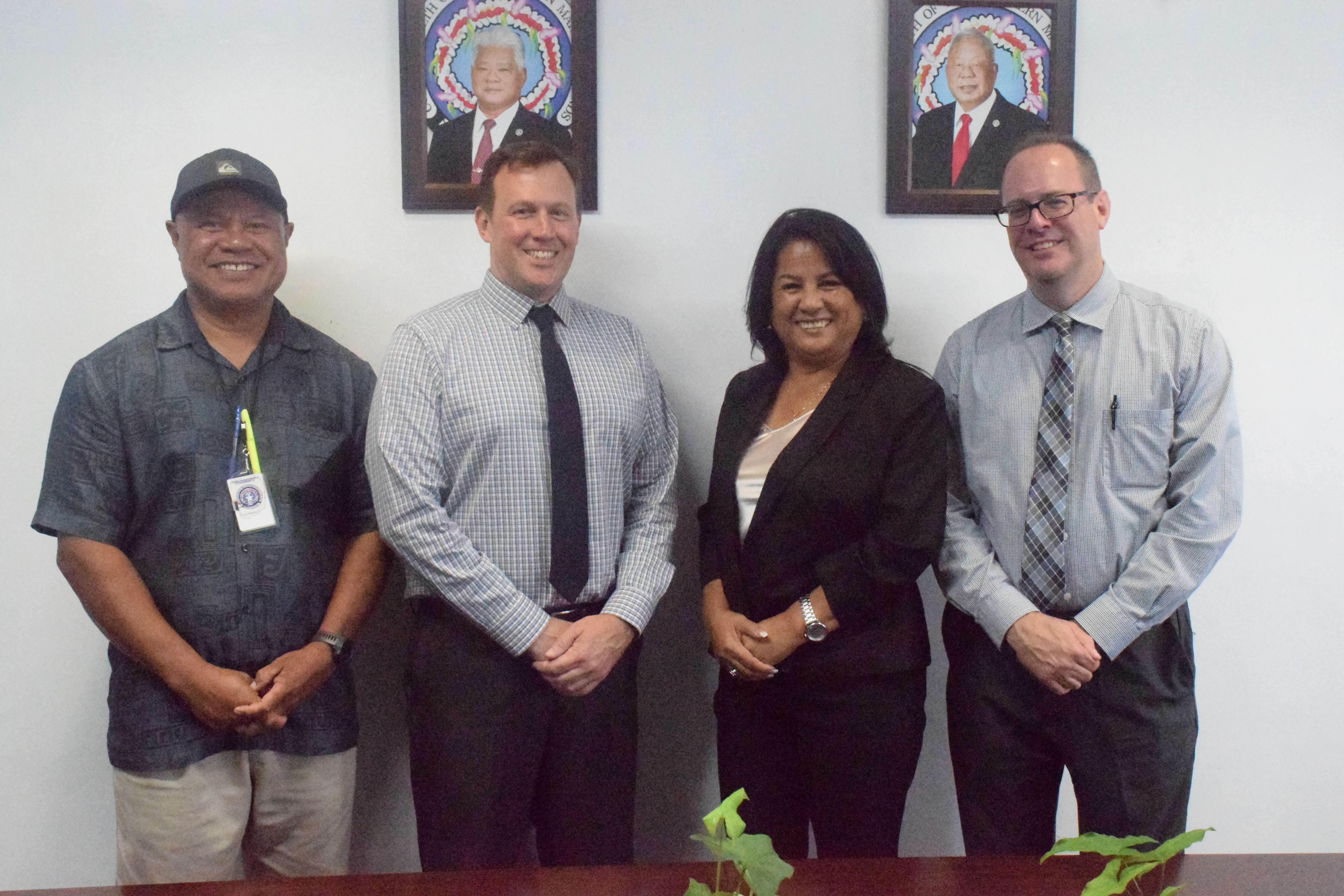 Acting Commerce Secretary Remedio C. Mafnas, 2nd right, poses with U.S. Census Bureau Economic Census Assistant Survey Director Michael Sprung, Assistant Survey Director Staff Chief Bobby Nusz and Central Statistics Director Justin Andrew on Thursday.