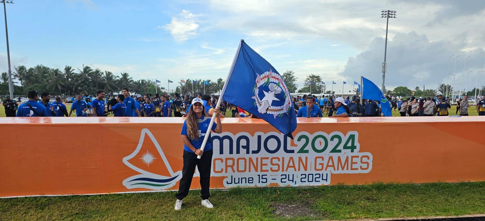 Basketball and athletics’ Lia Rangamar is one of the two flag bearers for Team Marianas at the closing ceremony of the 2024 Micronesian Games Monday in the Marshall Islands.