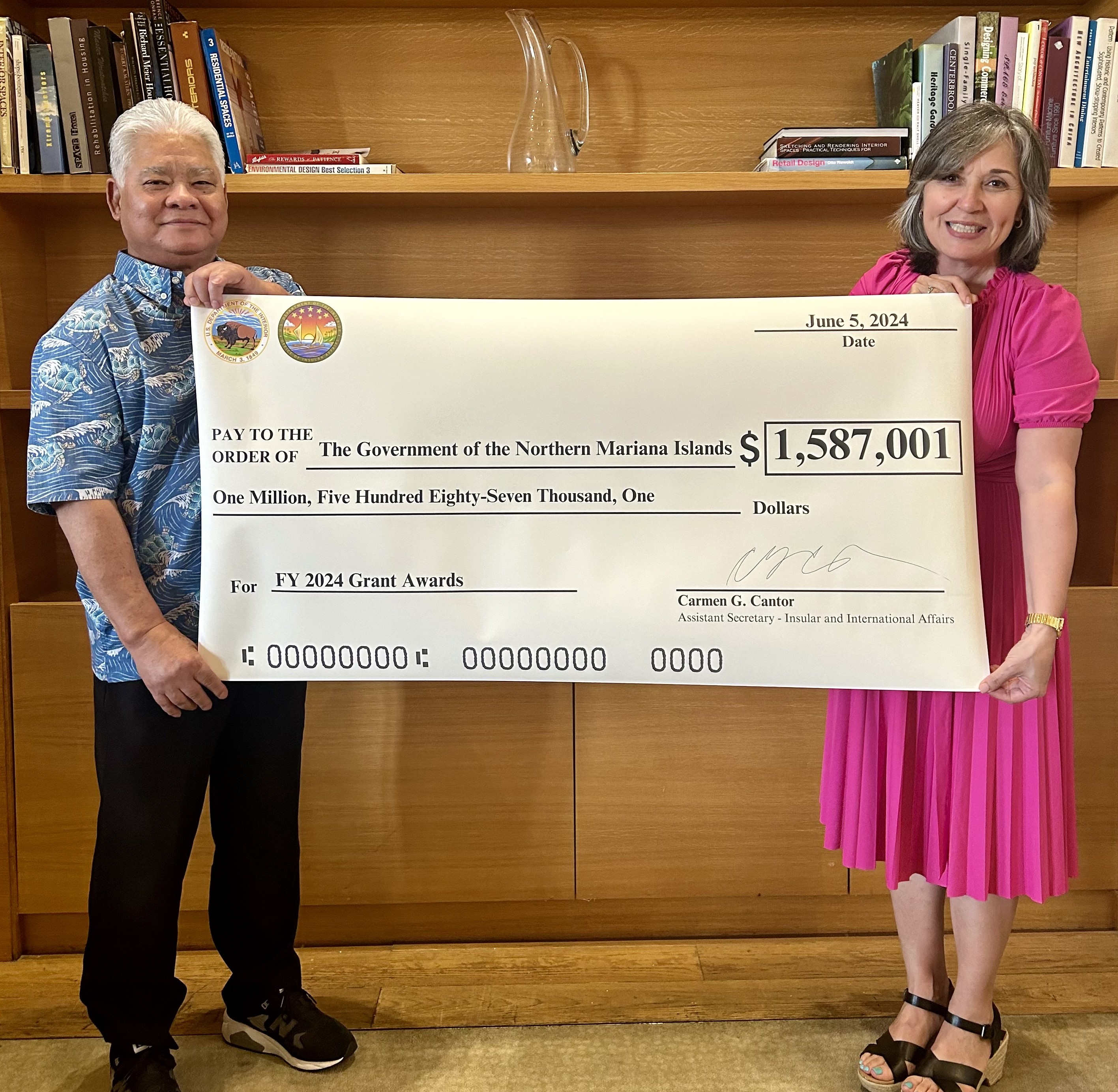 Interior’s Assistant Secretary for Insular and International Affairs Carmen G. Cantor, right, with CNMI Gov. Arnold I. Palacios.