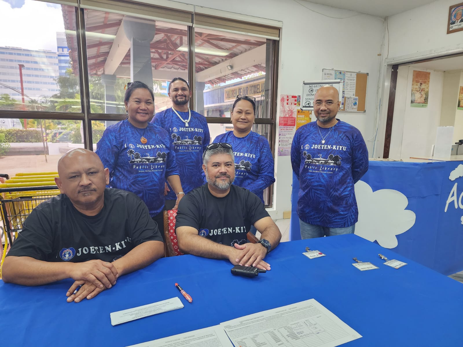 From left, standing, are Joeten-Kiyu Public Library Executive Director Erlinda Naputi, staff members Ray Deleon Guerrero Jr., Celina C. Foreman and Omar Manacop. From left, seated,  Vincent Sablan and Silver Balisalisa.