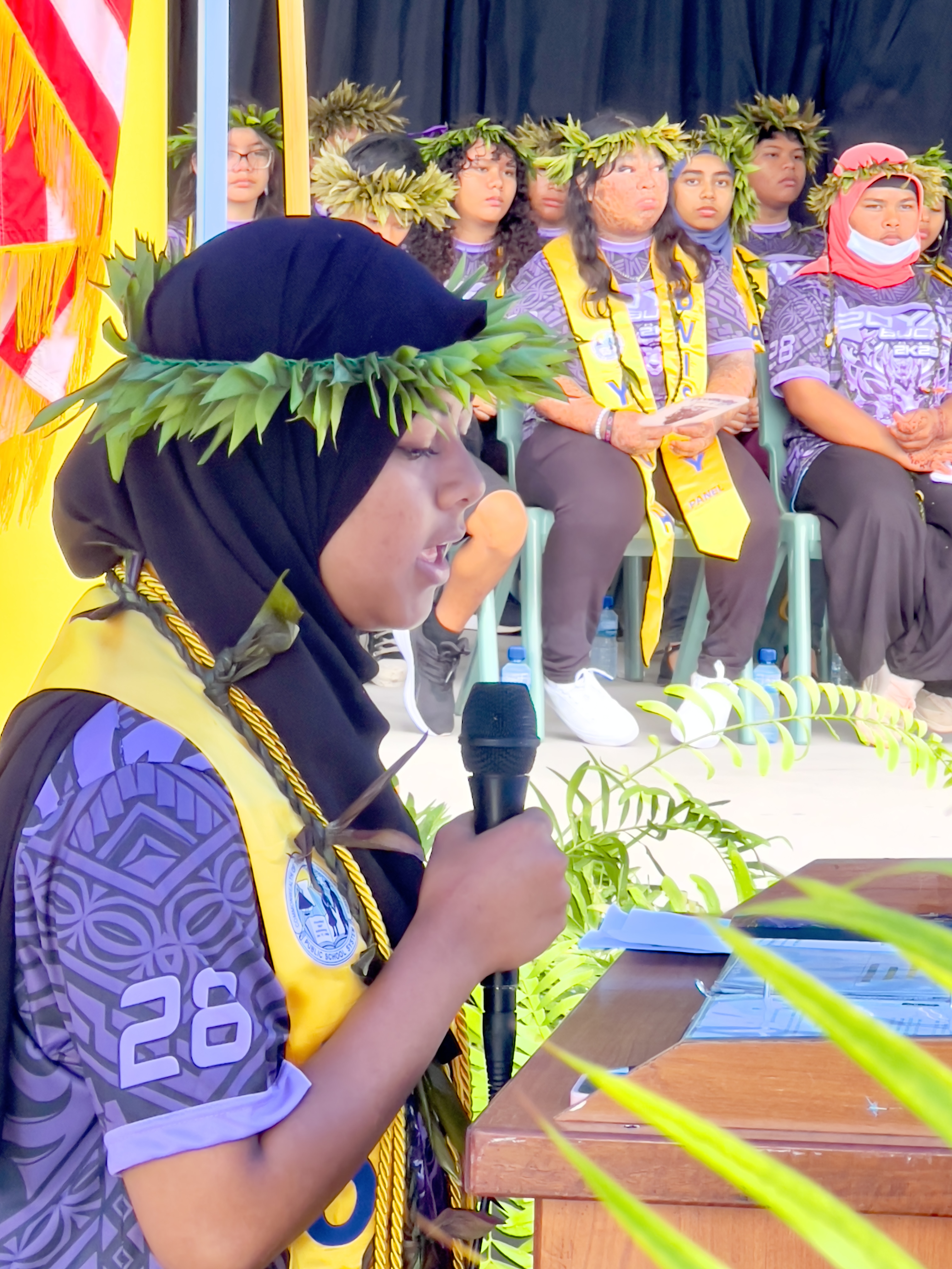 Class valedictorian Sayema A. Sidur delivers her address.