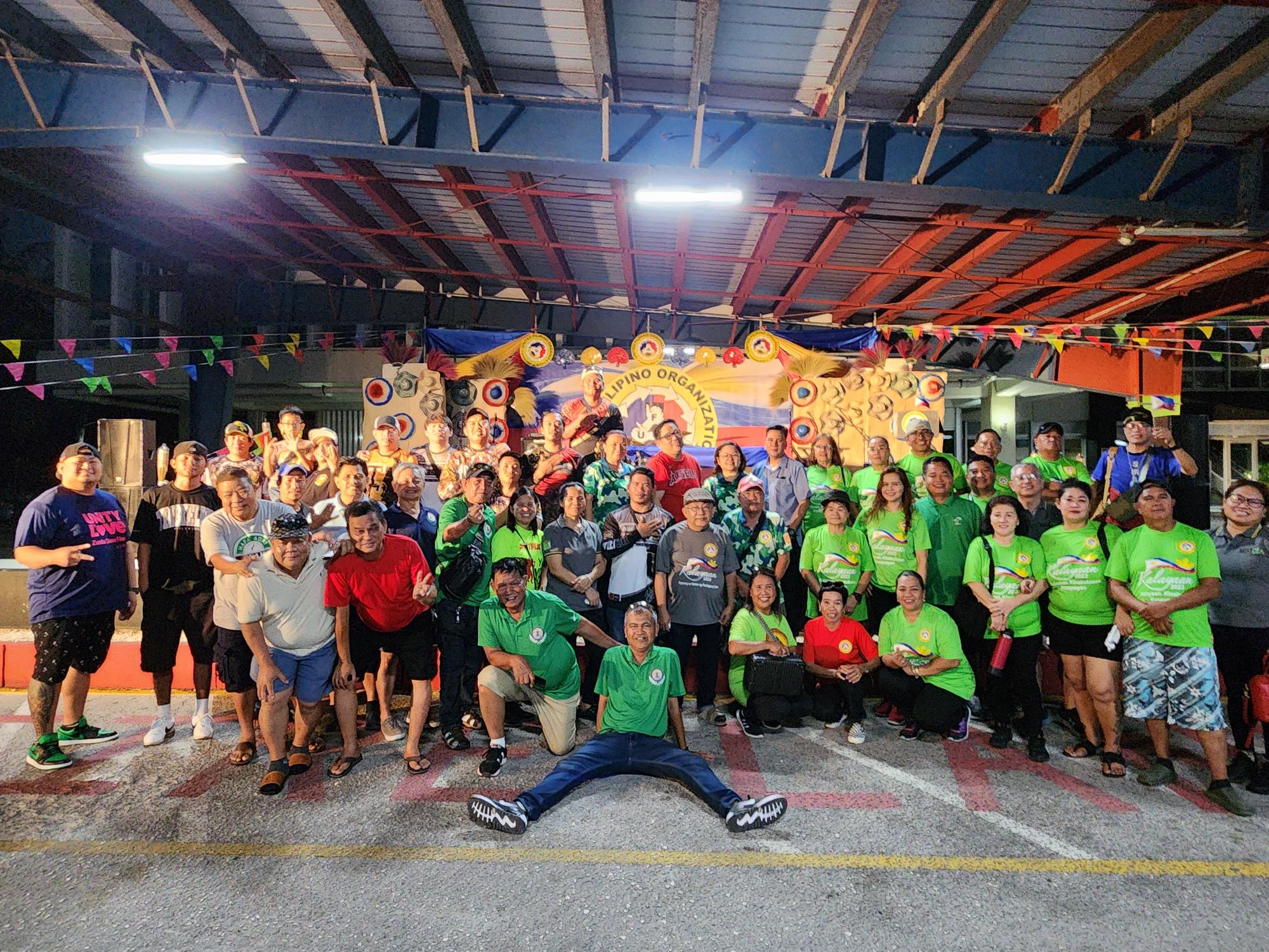 United Filipino Organizations members pose for a group photo during “Pistang Pinoy” on Sunday at Marianas Business Plaza