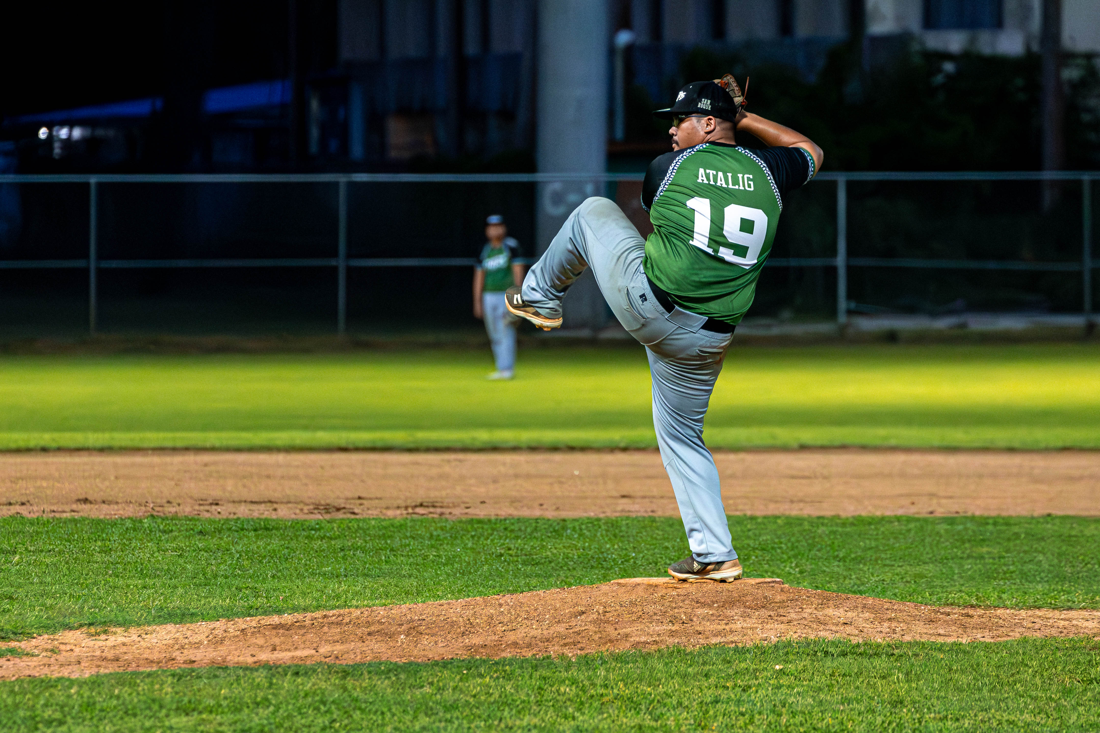 D9er's #19 Atalig winds up for a pitch against the Cardinals.