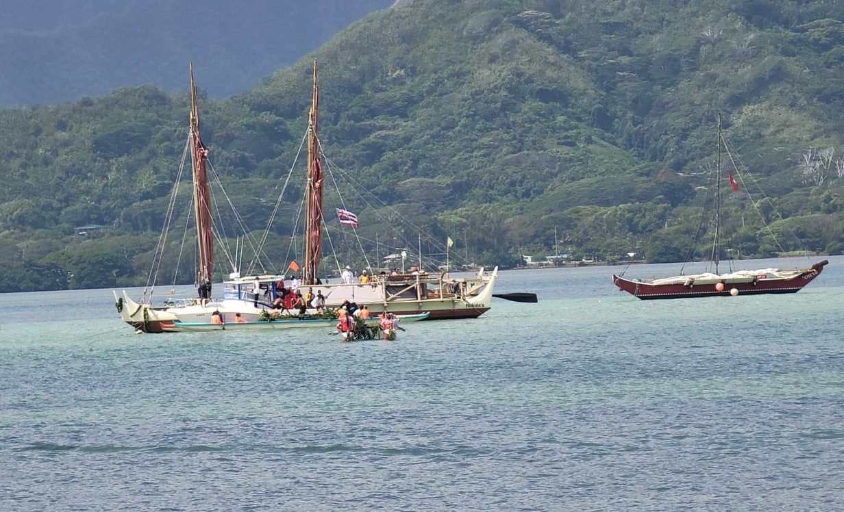 Che'lu, on the right, is moored in the waters of Kualoa Regional Park on June 5, right next to the Hawaiian vessel Hokule'a.