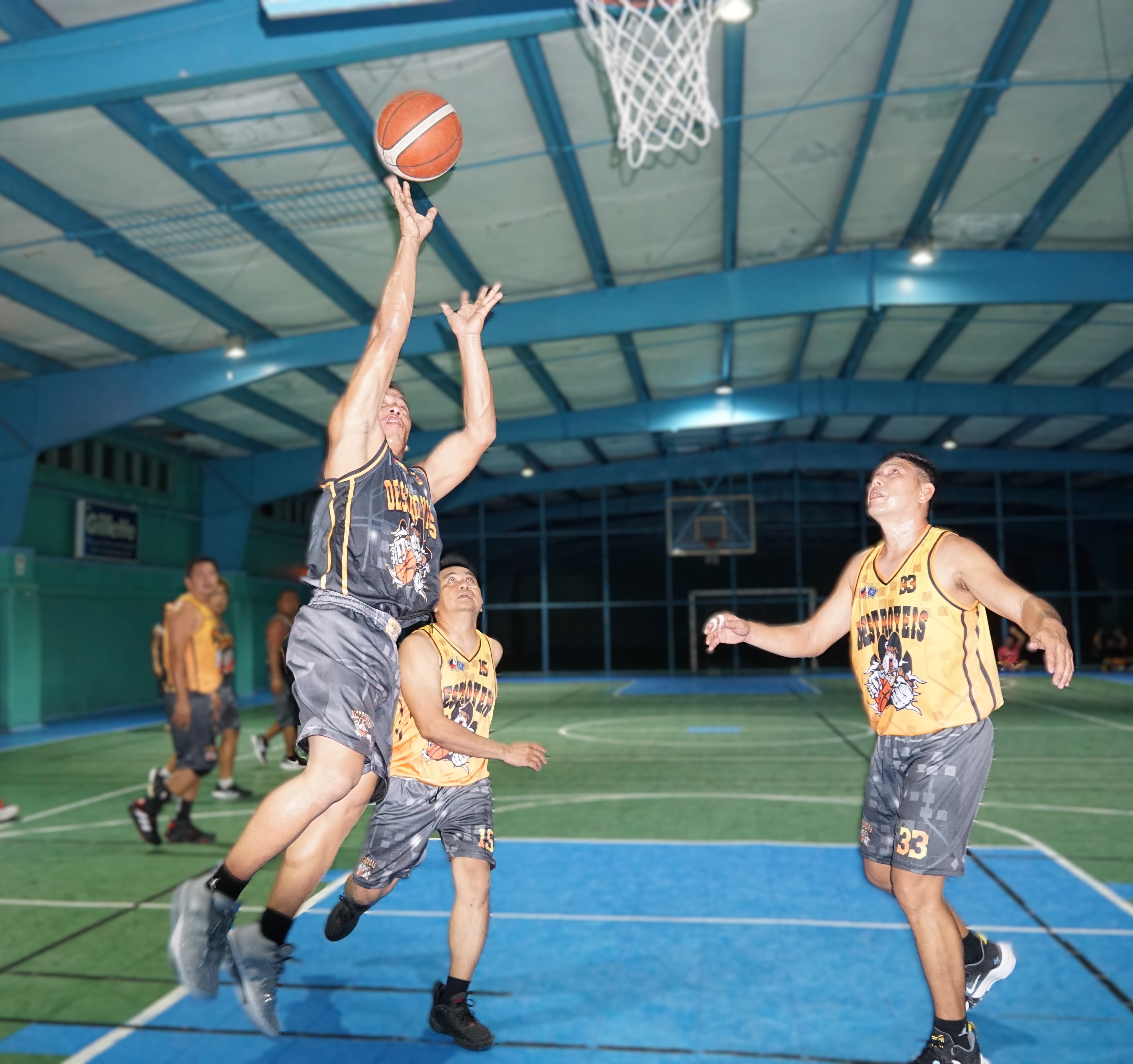 Bio-Pro's Ryan Bayna takes the uncontested shot during a game in the Destroyers Friendly Games League at the TSL Sports Complex.