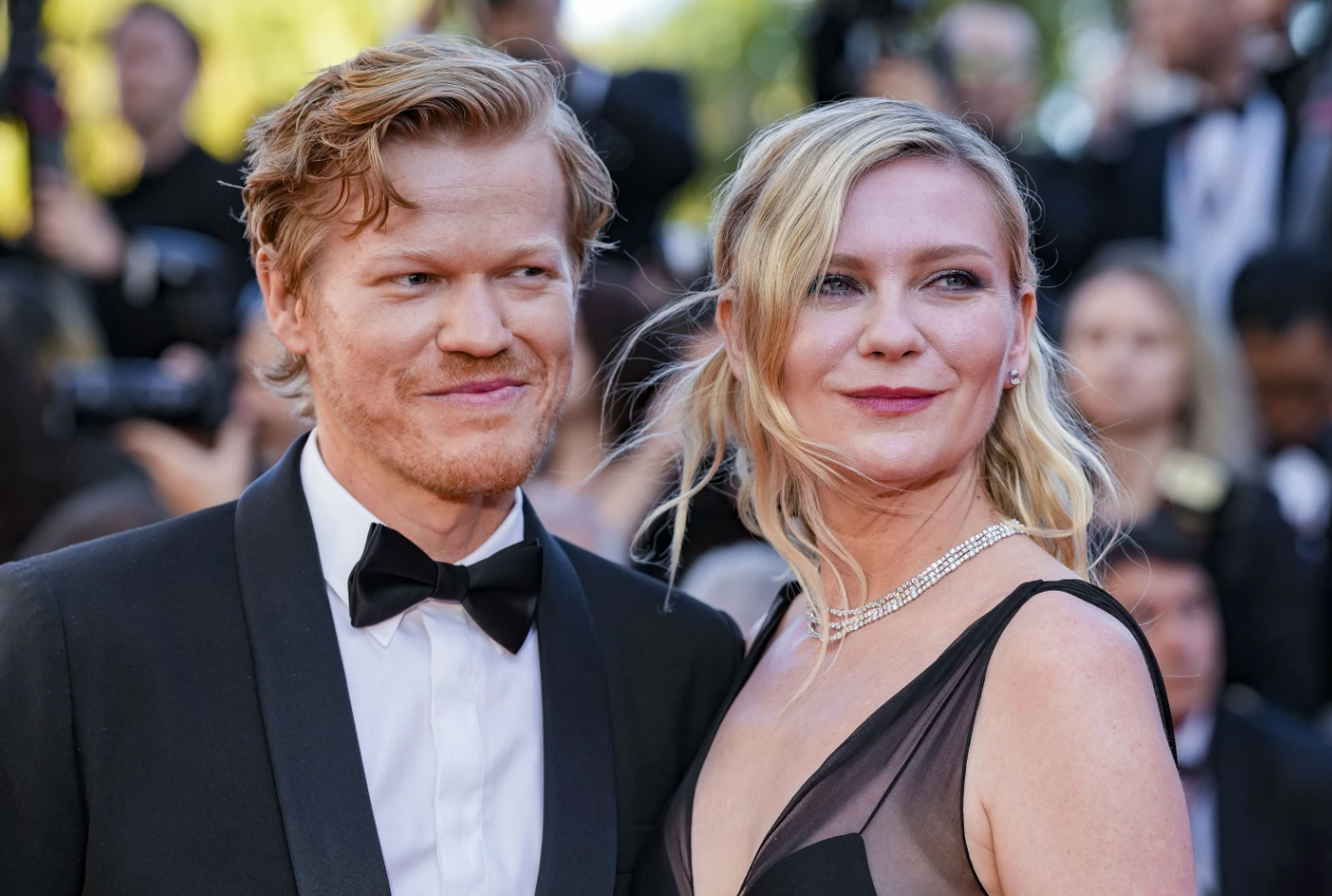 Jesse Plemons, left, and wife Kirsten Dunst pose for photographers upon arrival at the premiere of the film "Kinds of Kindness" at the 77th international film festival, Cannes, southern France on May 17, 2024.