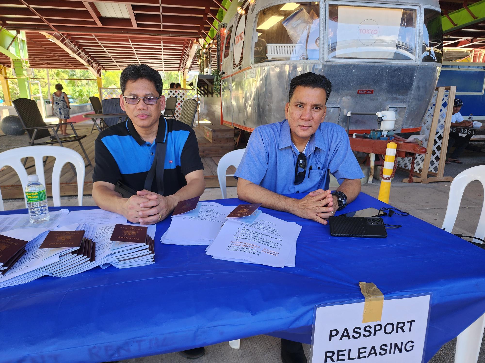 Philippine Consul to Guam Joaquin Ricardo Aragon, right, and records officer Rudy Hilot conducted consular services at the “Pistang Pinoy” on Sunday.