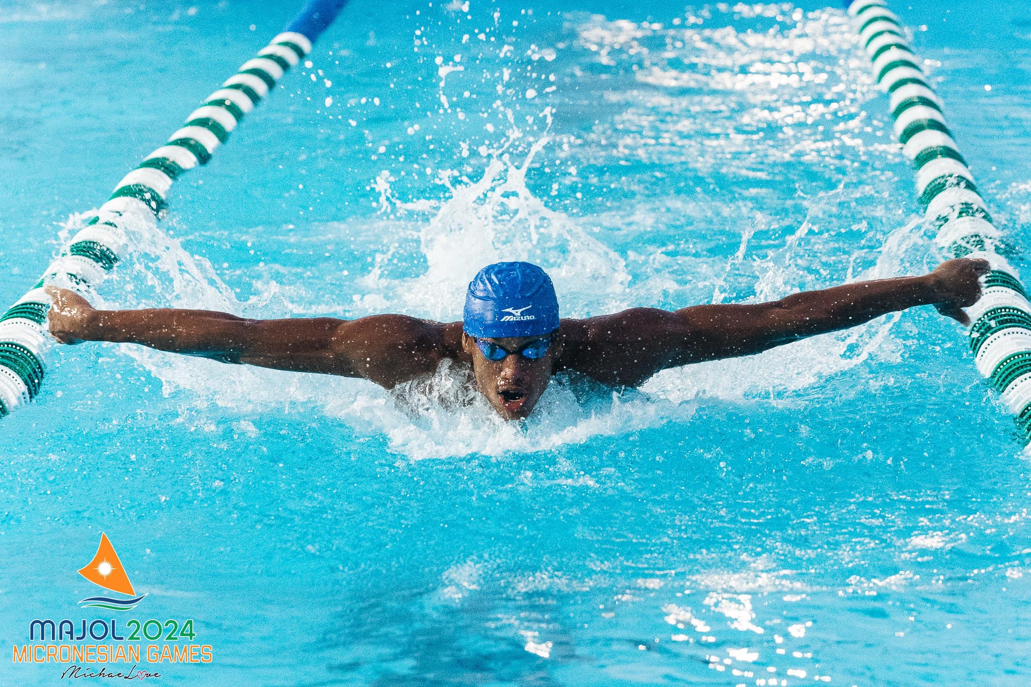 The NMI’s Isaiah Aleksenko, seen here racing on Day 2 of the swimming competition in the 2024 Micronesian Games in Kwajalein, won two more individual gold medals Tuesday night.