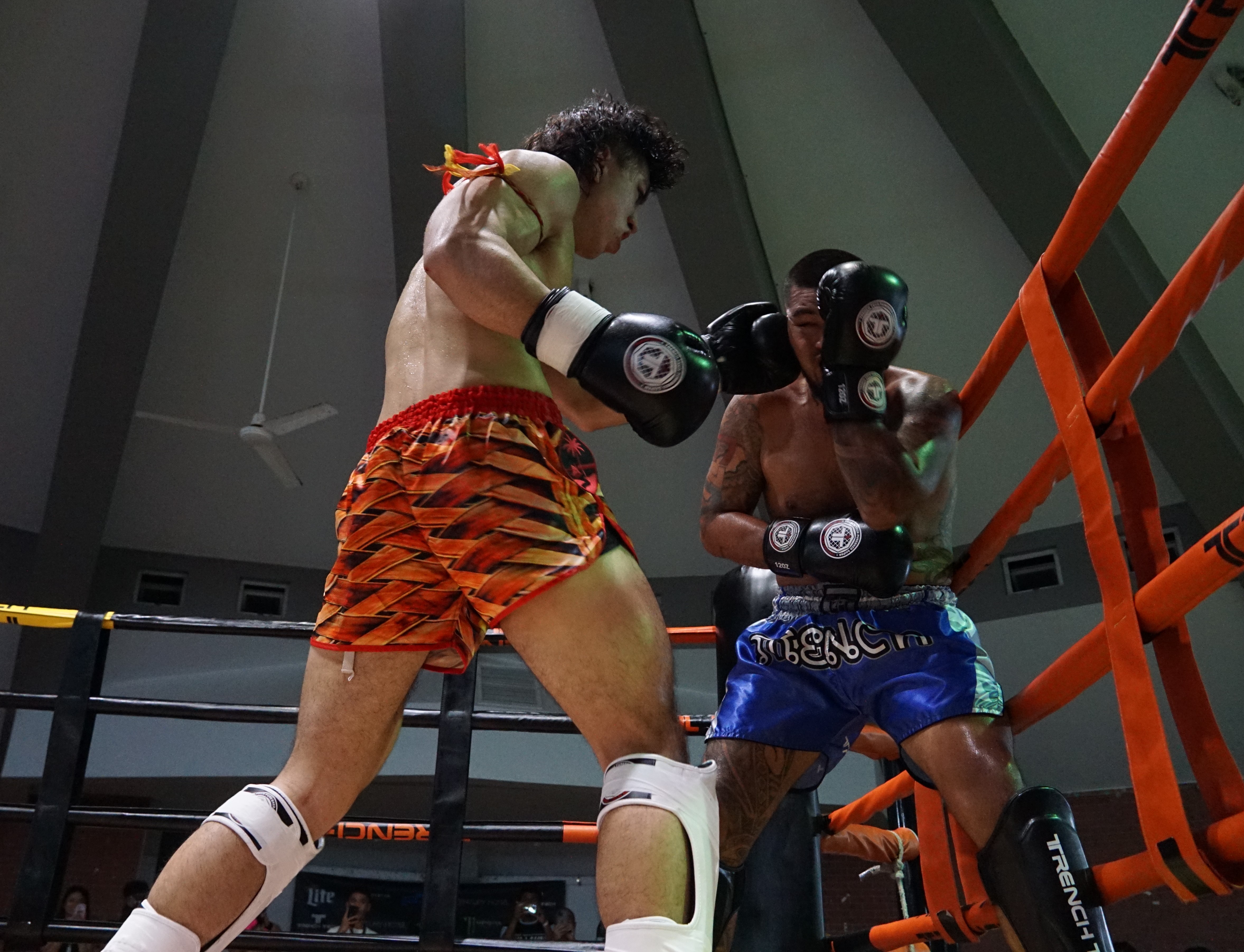 Isaac "Tiger Heart" Crisostomo lands a left hook against Shane "Pikaboo" Alvarez.