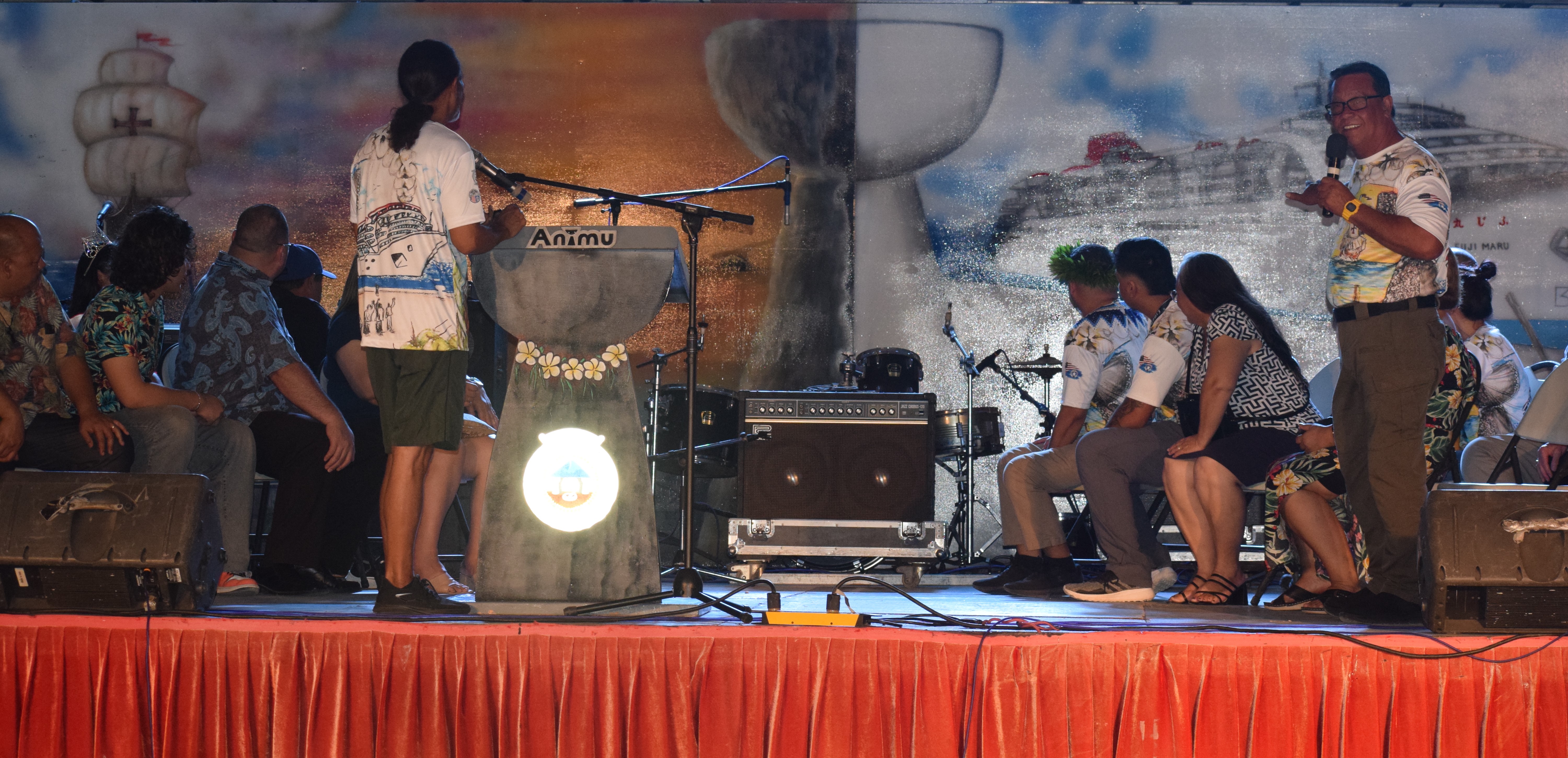 Saipan Mayor Ramon Blas "RB" Camacho, right, led the unveiling of the 78th Liberation Day mural during the opening of the festivities at the Garapan Fishing Base on Saturday.