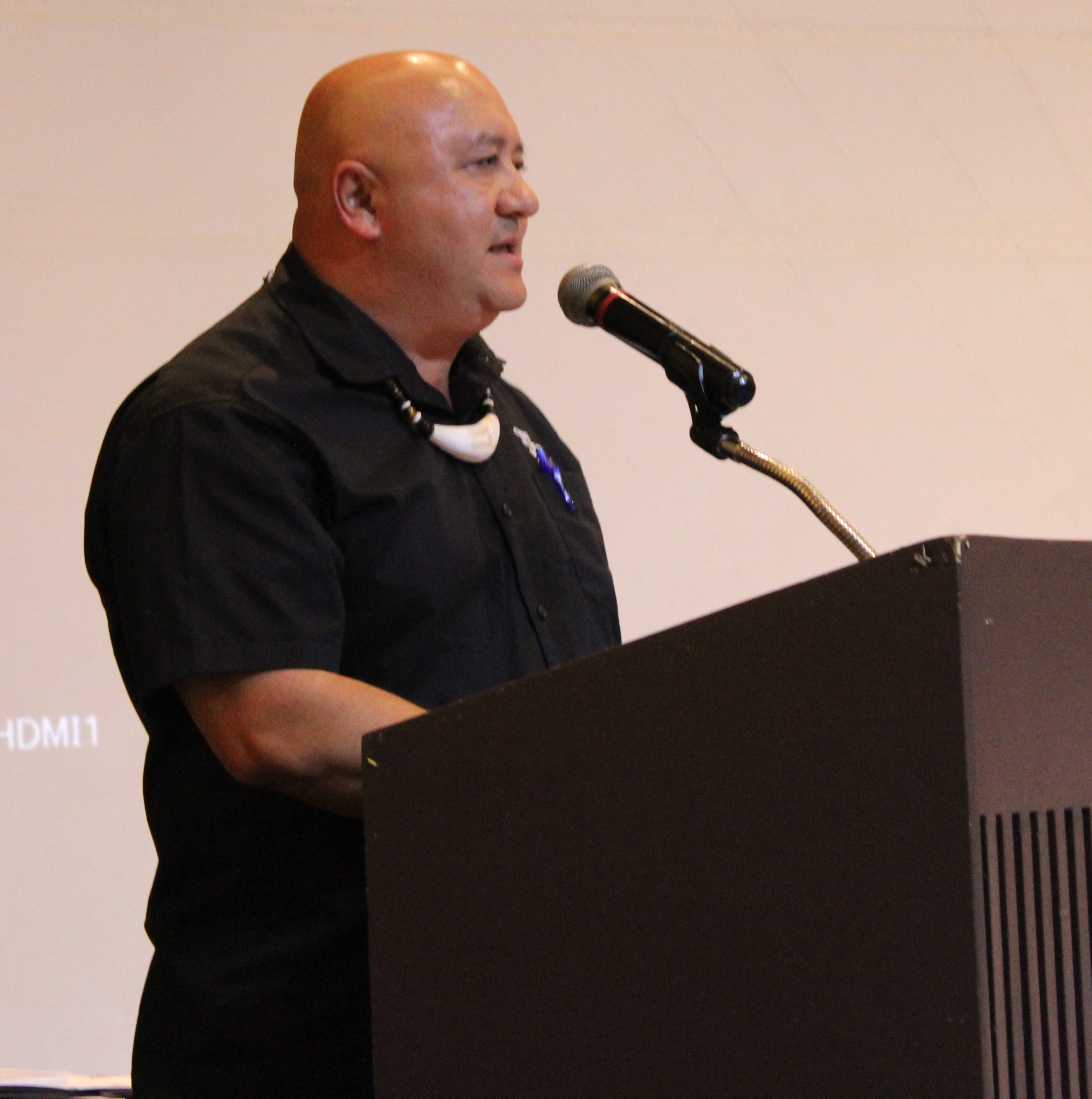 The keynote speaker, Education Commissioner Dr. Lawrence Camacho addresses the newly certified hospitality students.