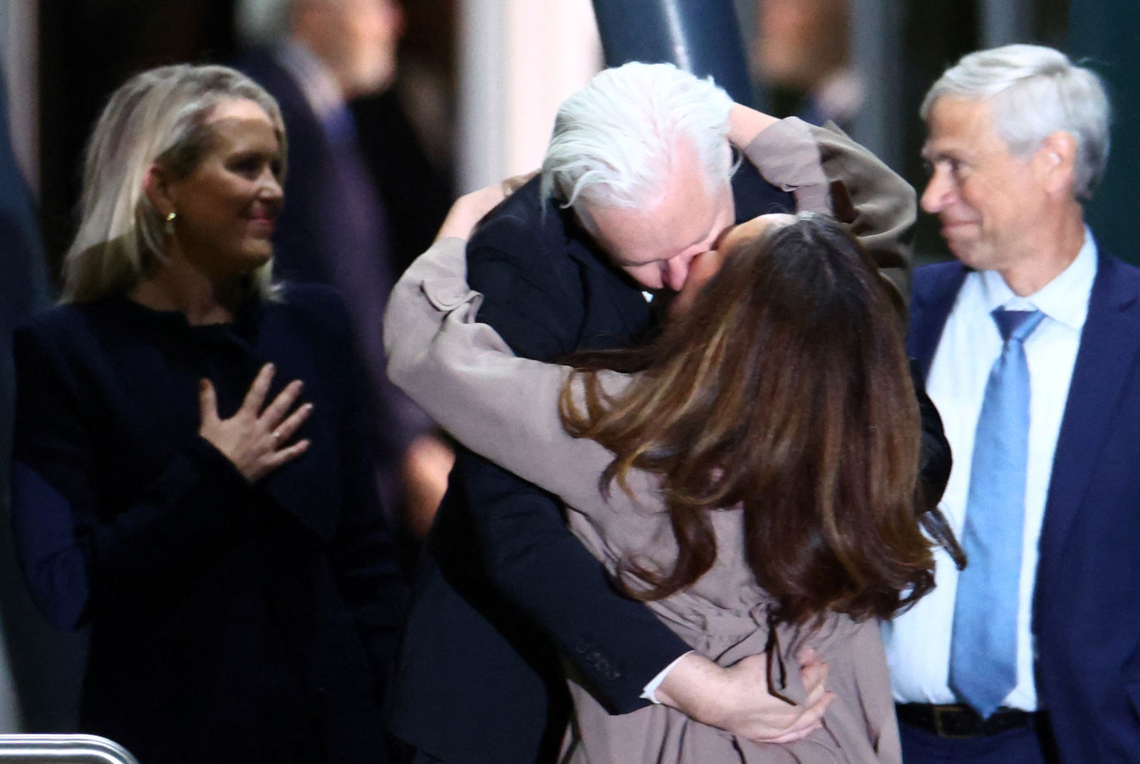 WikiLeaks founder Julian Assange kisses his wife Stella Assange as he arrives in Canberra, Australia, June 26, 2024. 