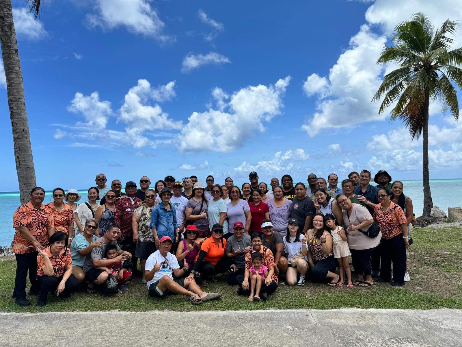 Current and former employees of Hyatt Regency Saipan pose for a group photo during a get-together at the Micro Beach Pavilion on Saturday.