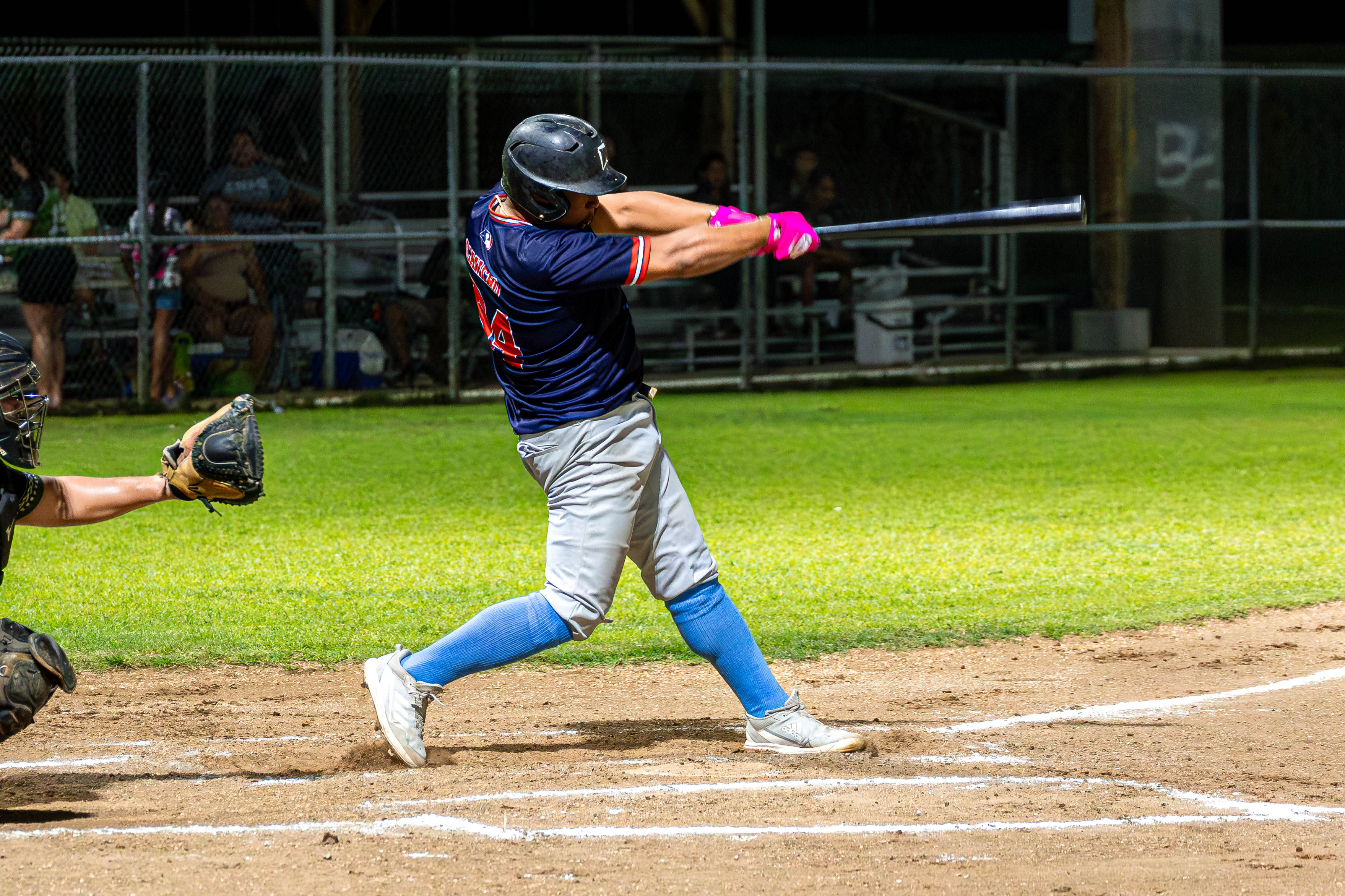Cardinals' #94 Camacho swings a heavy swing for a Triple against the D9ners.