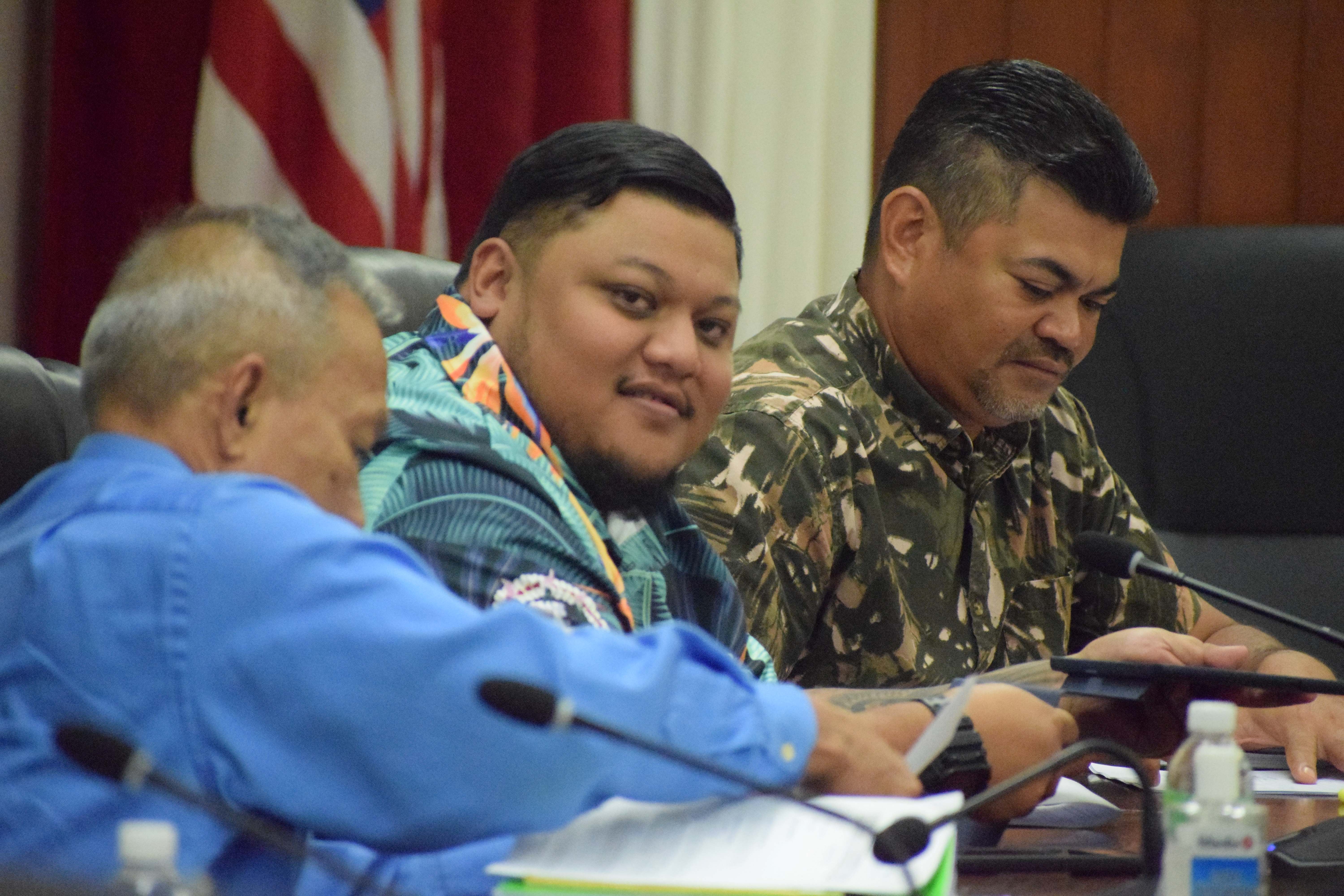 Rep. Thomas John Manglona, center, with Reps. Roy Ada, right, and Vicente Camacho during a House session on Tuesday.