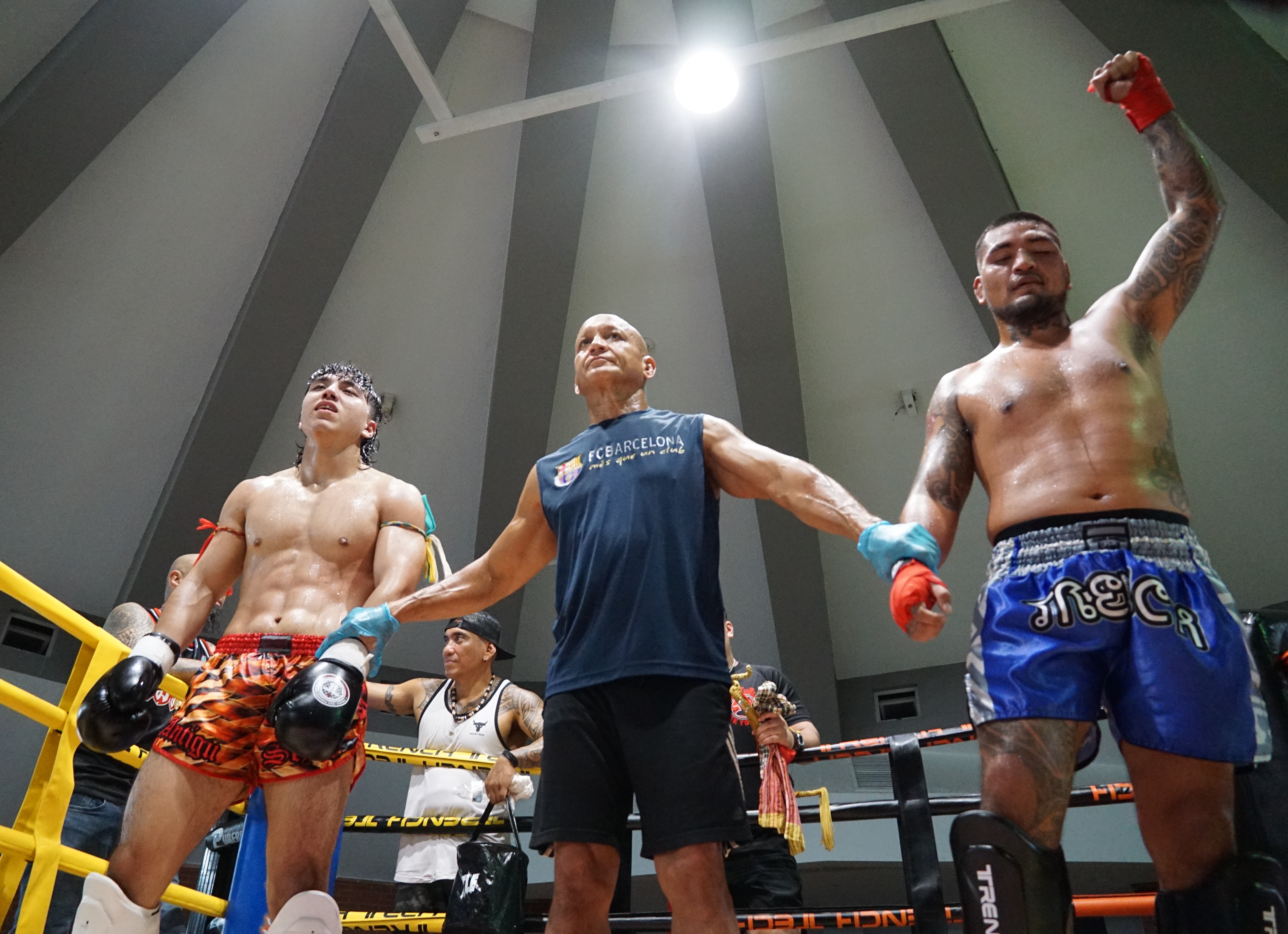 Shane "Pikaboo" Alvarez raises his hands after winning, via unanimous decision, his kickboxing match against Isaac "Tiger Heart" Crisostomo in the main event of the Ring of Fire 2 ay the Garapan Central Park on Saturday.