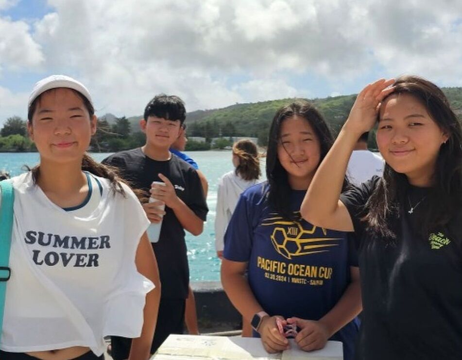 Students await the boat to Managaha.
