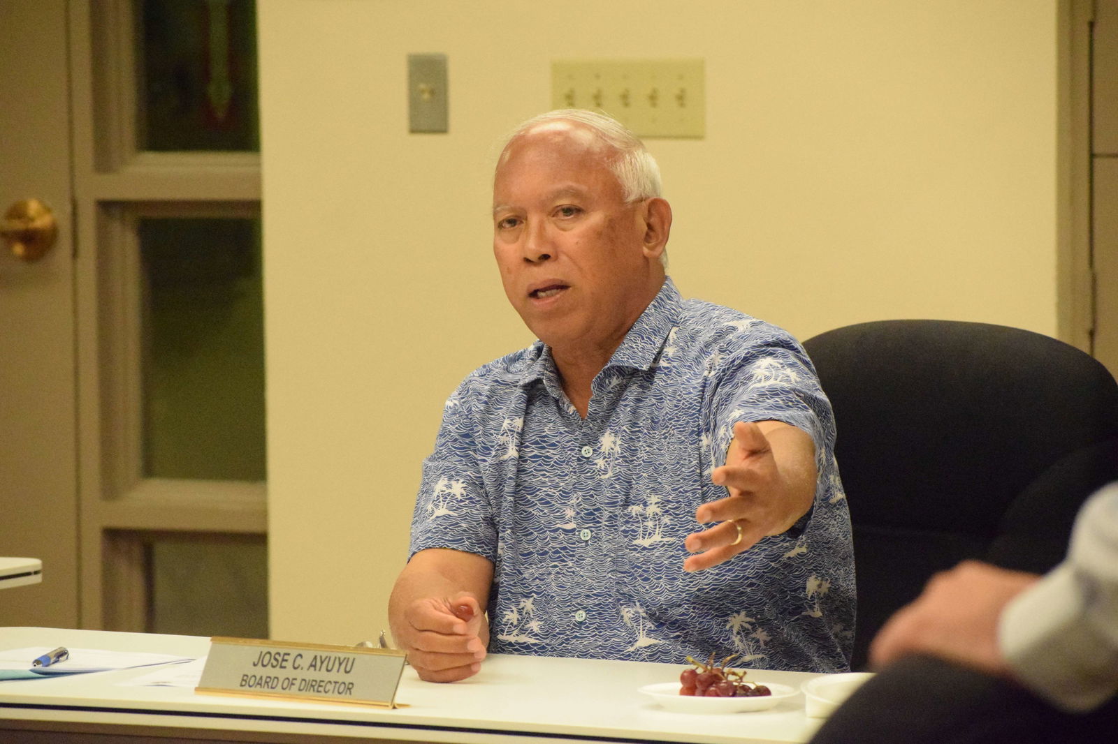 Commonwealth Ports Authority Board Chairman Jose C. Ayuyu gestures as he speaks during a special meeting in the Aircraft Rescue and Firefighting classroom at the Francisco C. Ada/Saipan International Airport on Thursday.