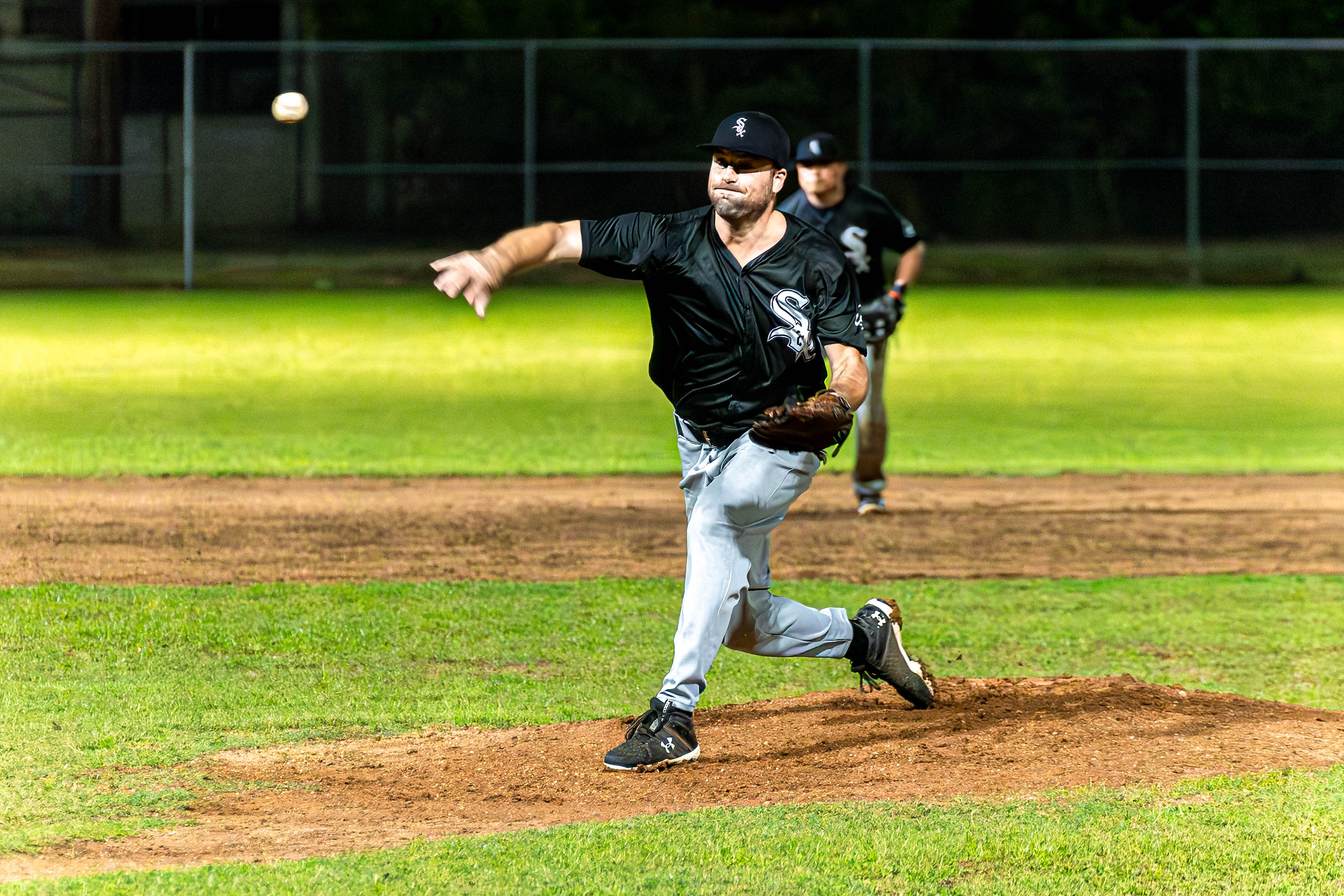 Alex Standish of the White Sox pitches against the Blue Sharks during a game in the 2024 Tan Holdings Saipan Baseball League at the Francisco "Tan Ko" Palacios Baseball Field on Friday.