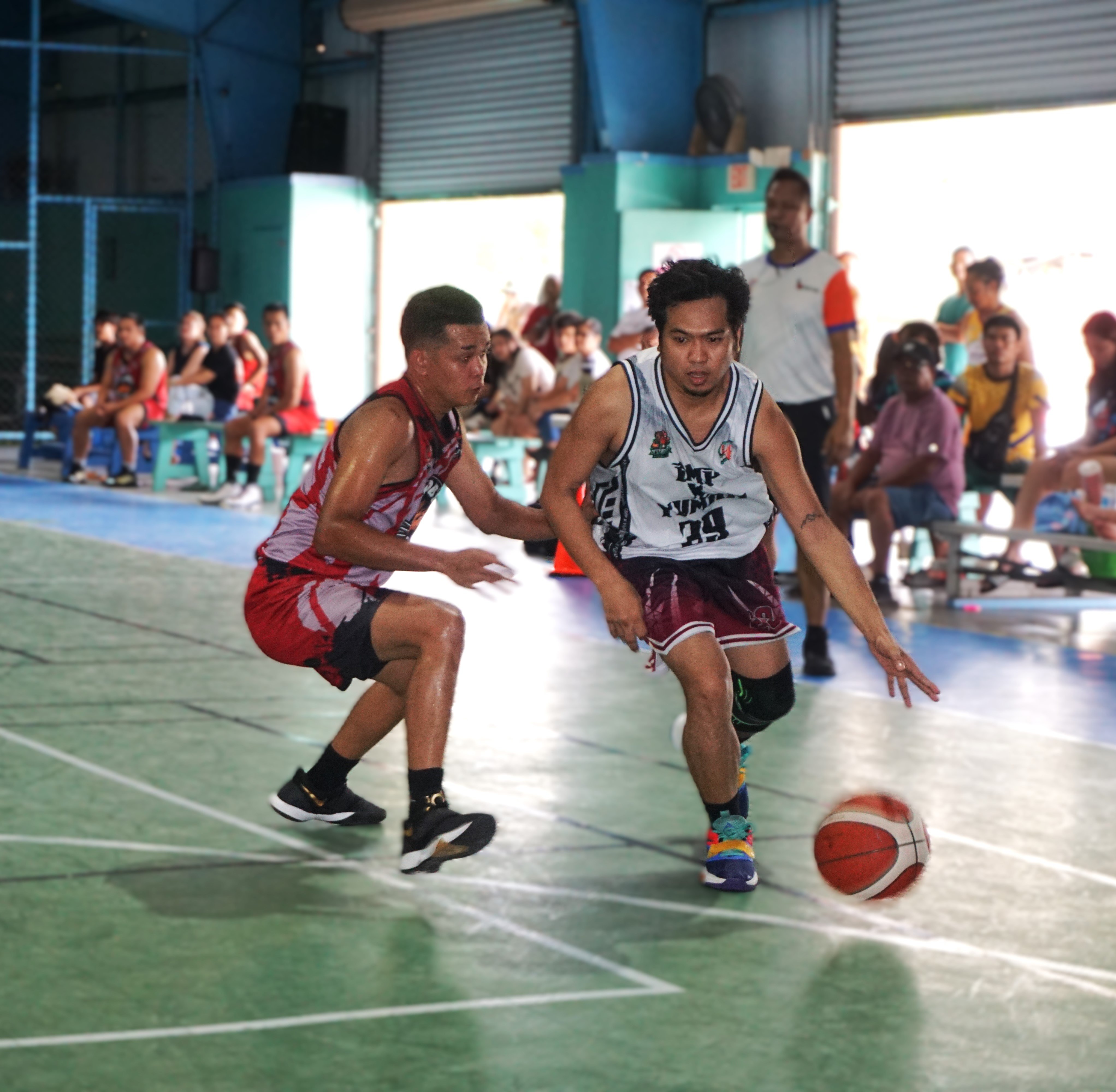 GMP x Yuman's Keith Nuyles drives past a defender during a game against Jacob's Bakeshop in the Destroyers Basketball Club Invitational Basketball League 2024 at the TSL Sports Complex on Sunday.