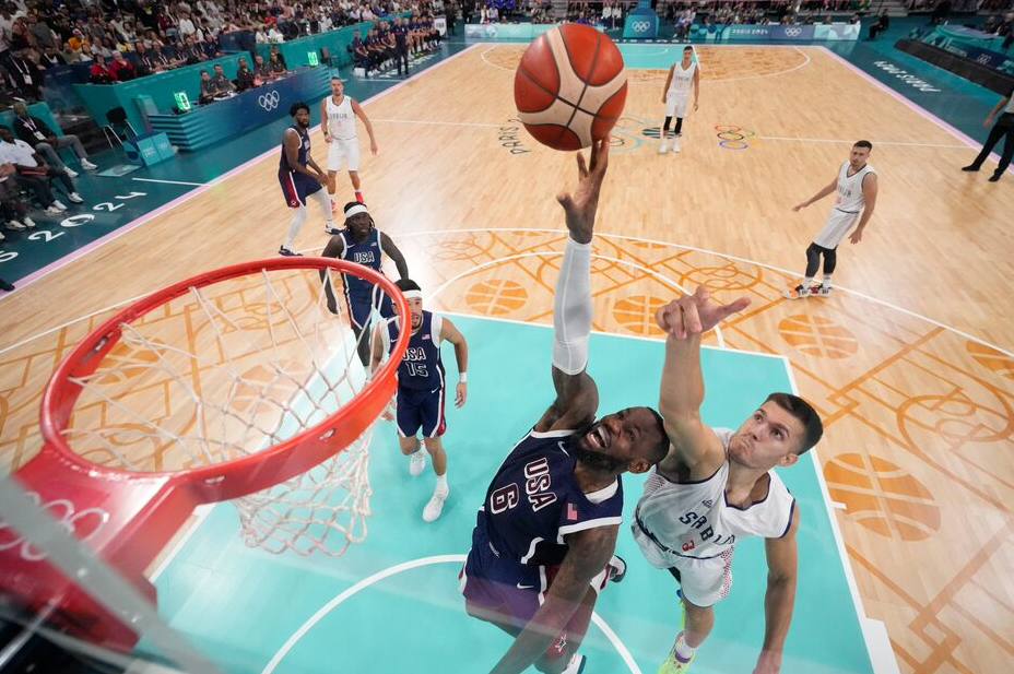 Lebron James of the United States in action against Serbia at Pierre Mauroy Stadium in Villeneve-d'Ascq, France on July 28, 2024.