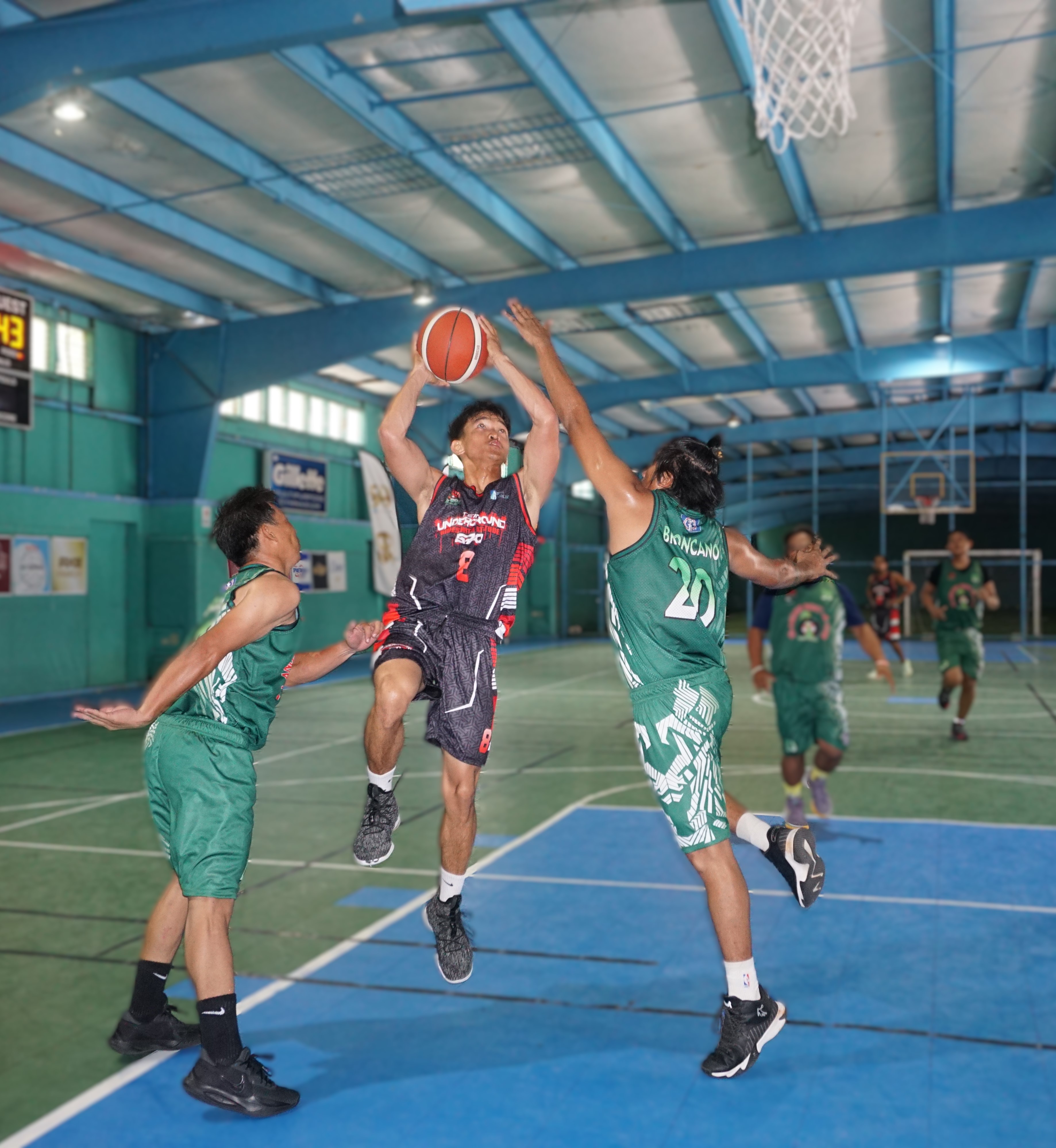 Team Underground’s Randel Nicodemus goes up for the heavily contested shot during a game of the Destroyers Basketball Club Invitational Basketball League 2024 at the TSL Sports Complex.