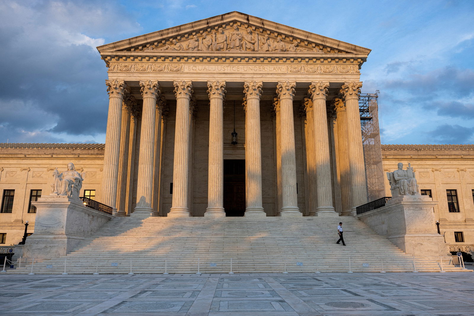 A security guard walks down the steps of the U.S. Supreme Court in Washington, D.C., July 19, 2024.
